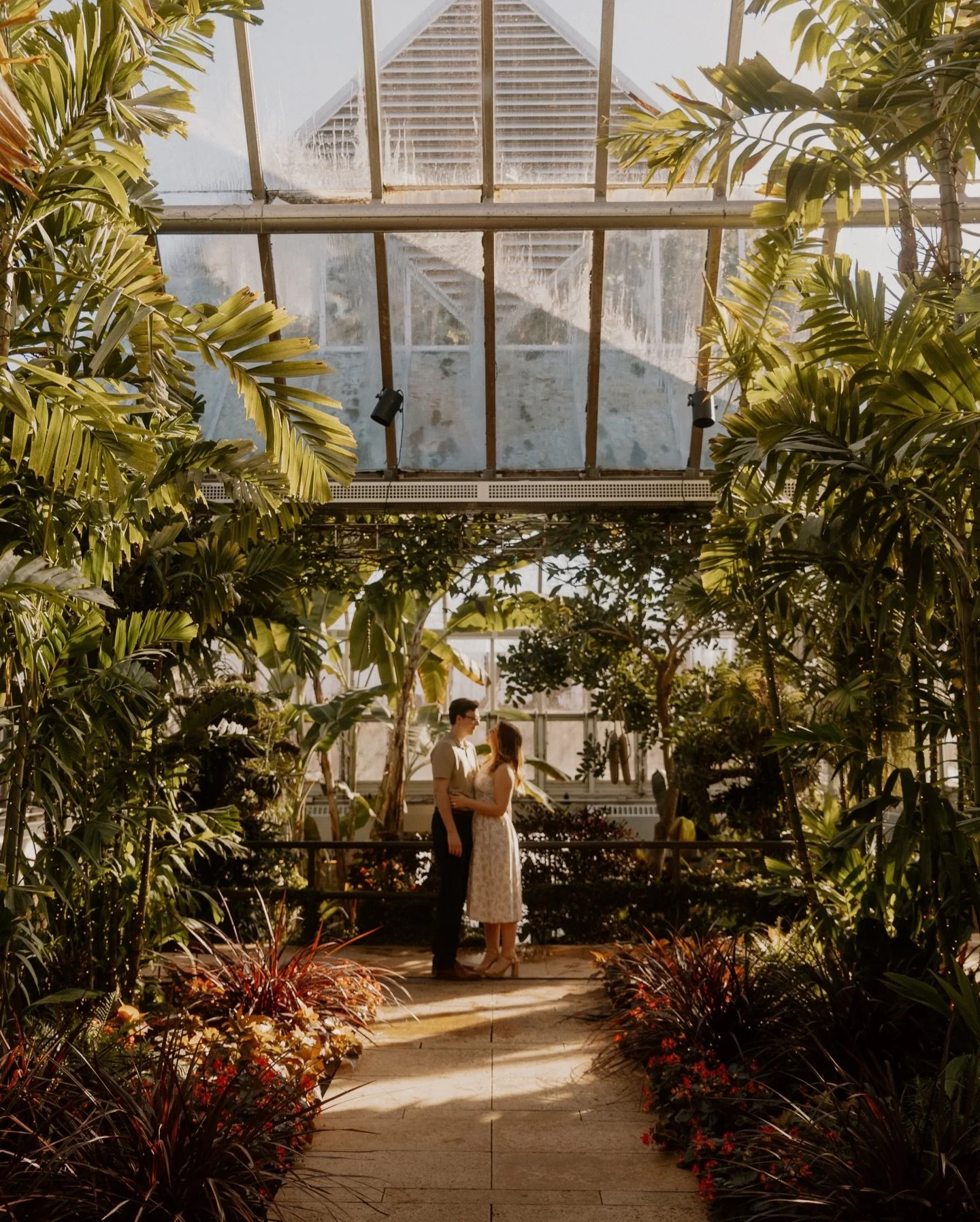 sub zero temperatures have nothing on these two with a love like this and the most beautiful green house 🤍✨🍃 so much whimsey and genuinely sweet moments between Kaylie and Ryan &mdash; we are counting down along with them for their big day this Nov