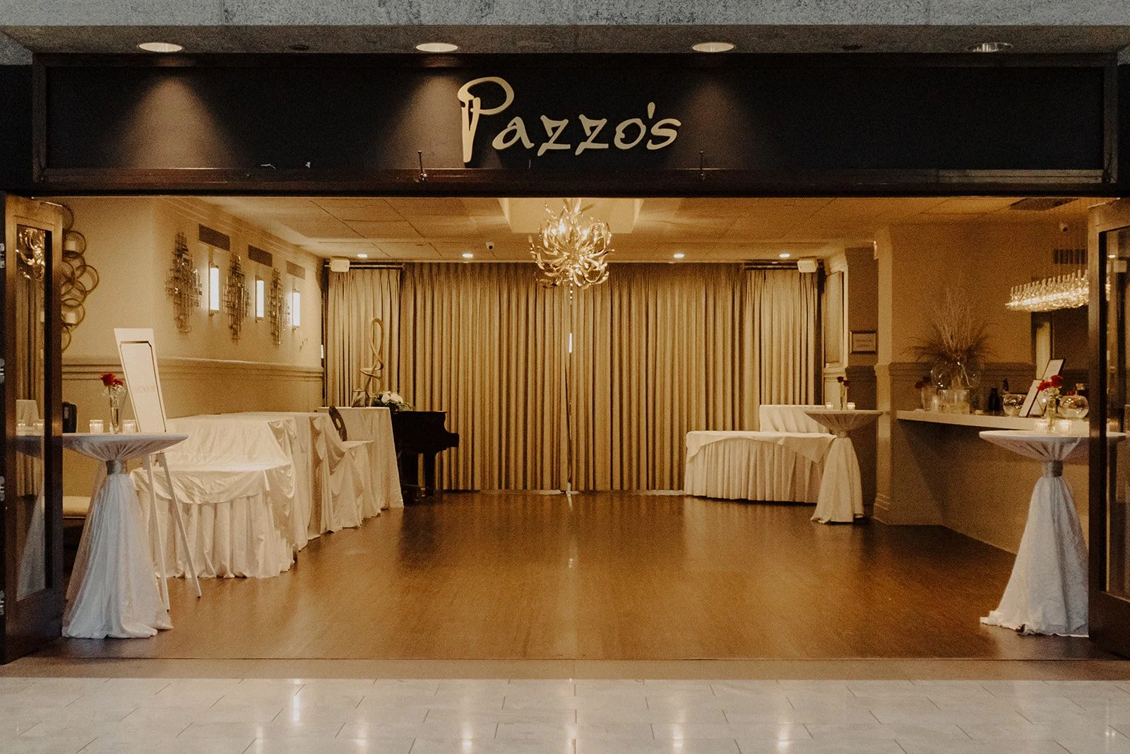 Pazzo's 311 Chicago signage is photographed at a winter wedding held at the venue.