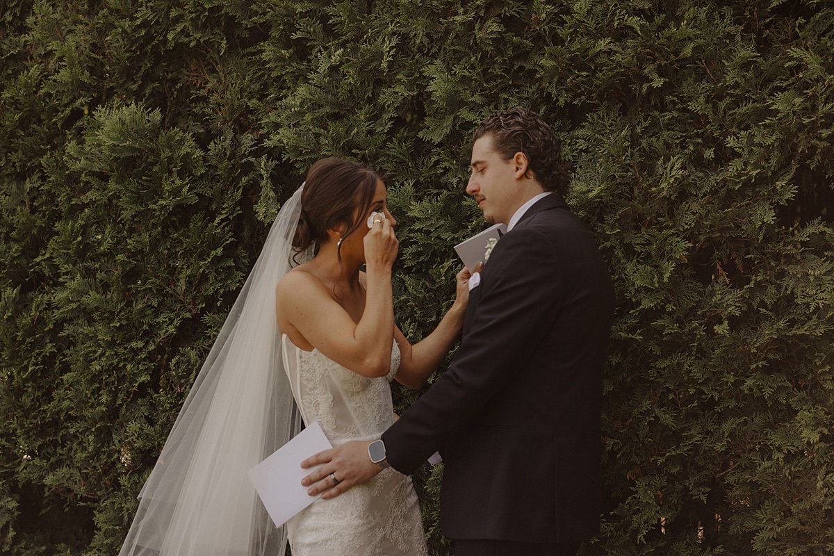 A couple shares an emotional first look before their wedding at The Chicago Winery