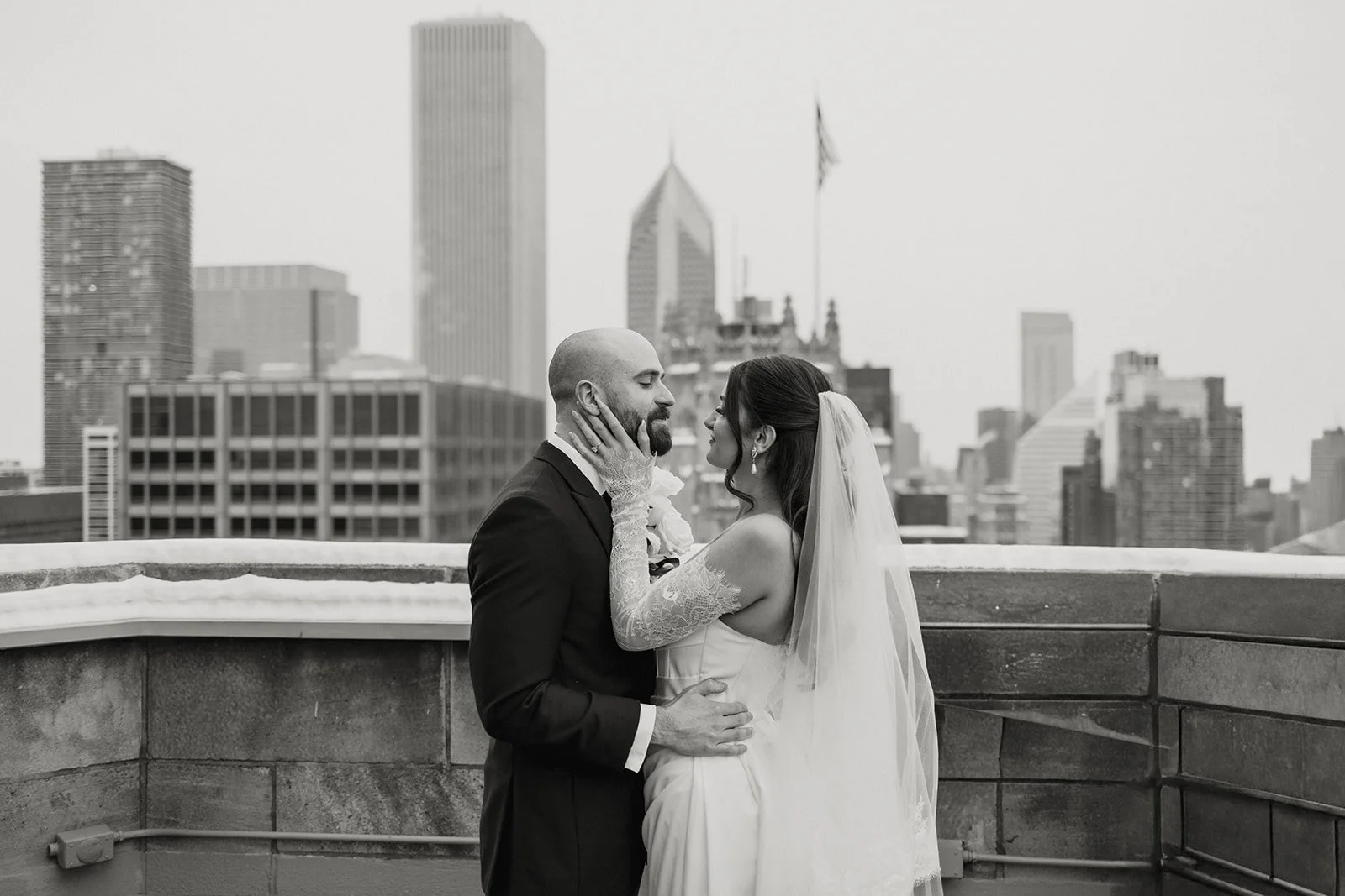 A black and white first look between a bride and groom at their Intercontinental Chicago wedding.
