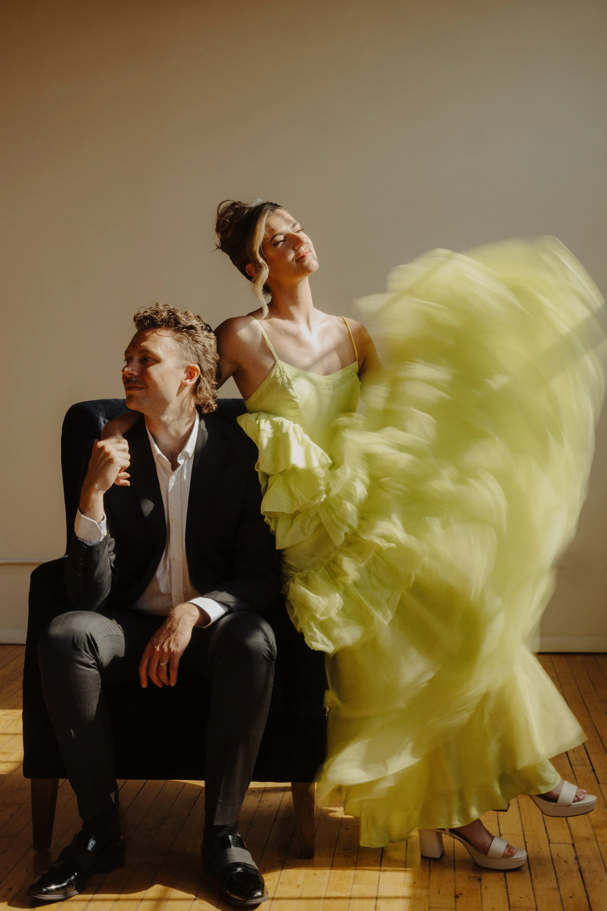 Stylized couple portrait in studio with flowing dress captured for Chicago wedding photography portfolio