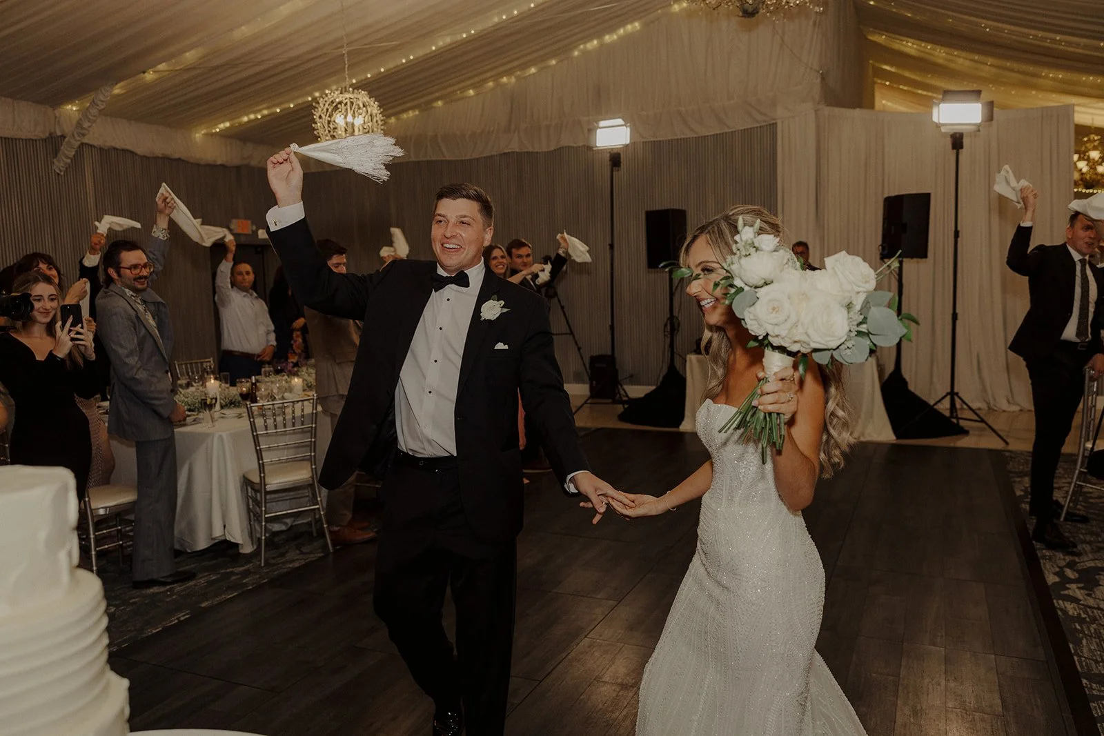 Newlyweds celebrate at their reception following their monte bello estate lemont wedding