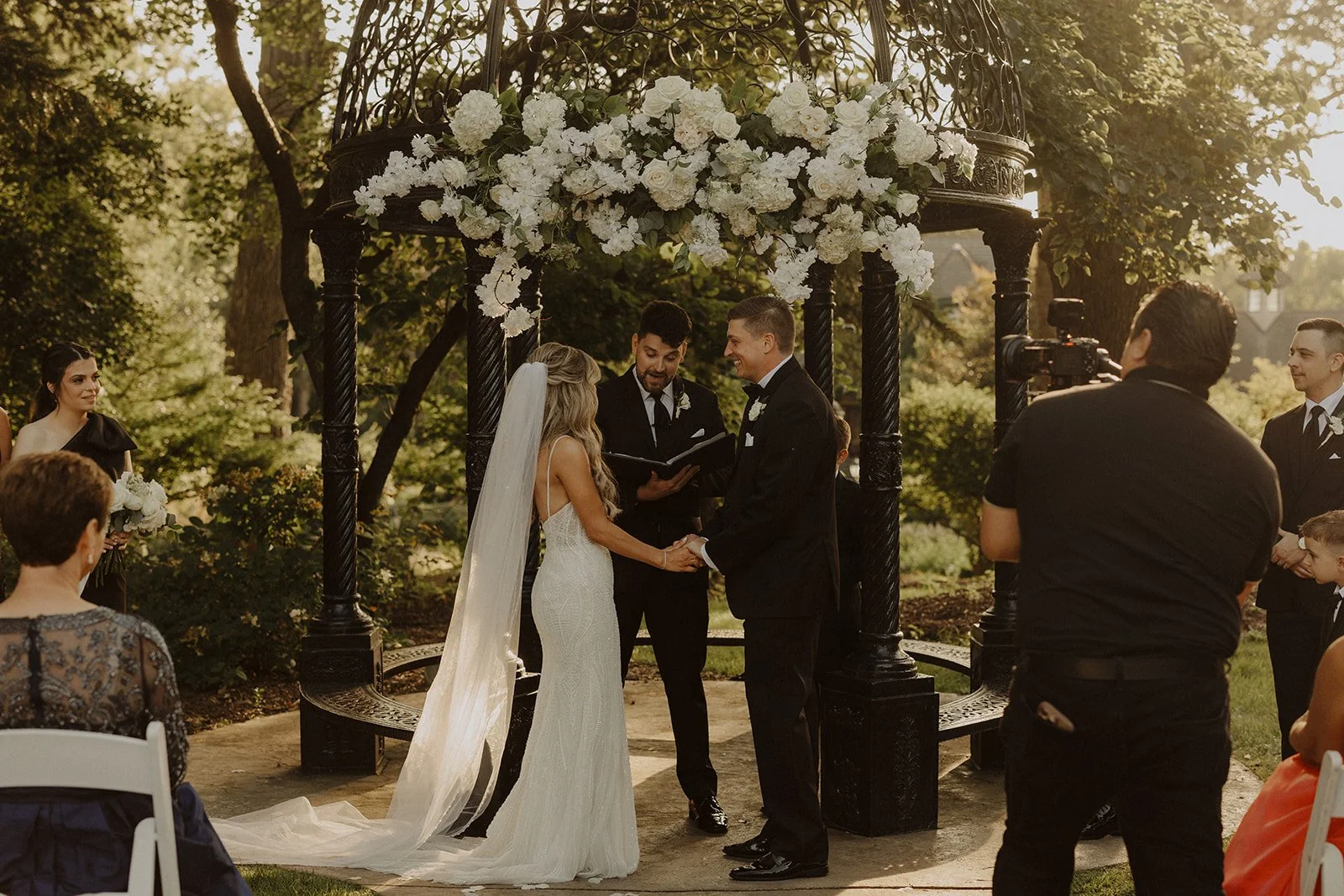 A bride and groom exchange vows at their Montebello Estates wedding ceremony