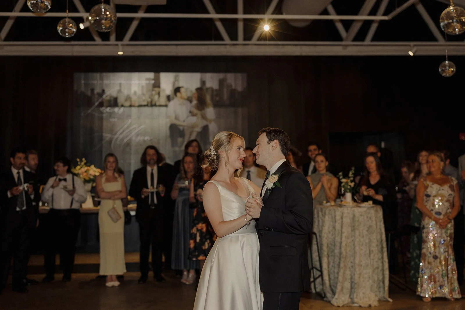 Newlyweds share a first dance at their reception at Sarabande, a chicago wedding venue