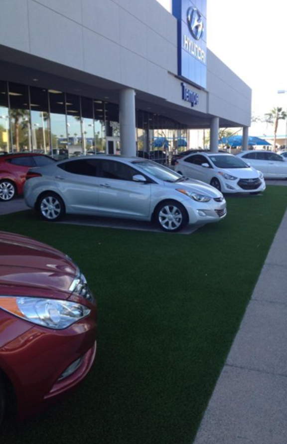  Artificial grass installation at car dealership 