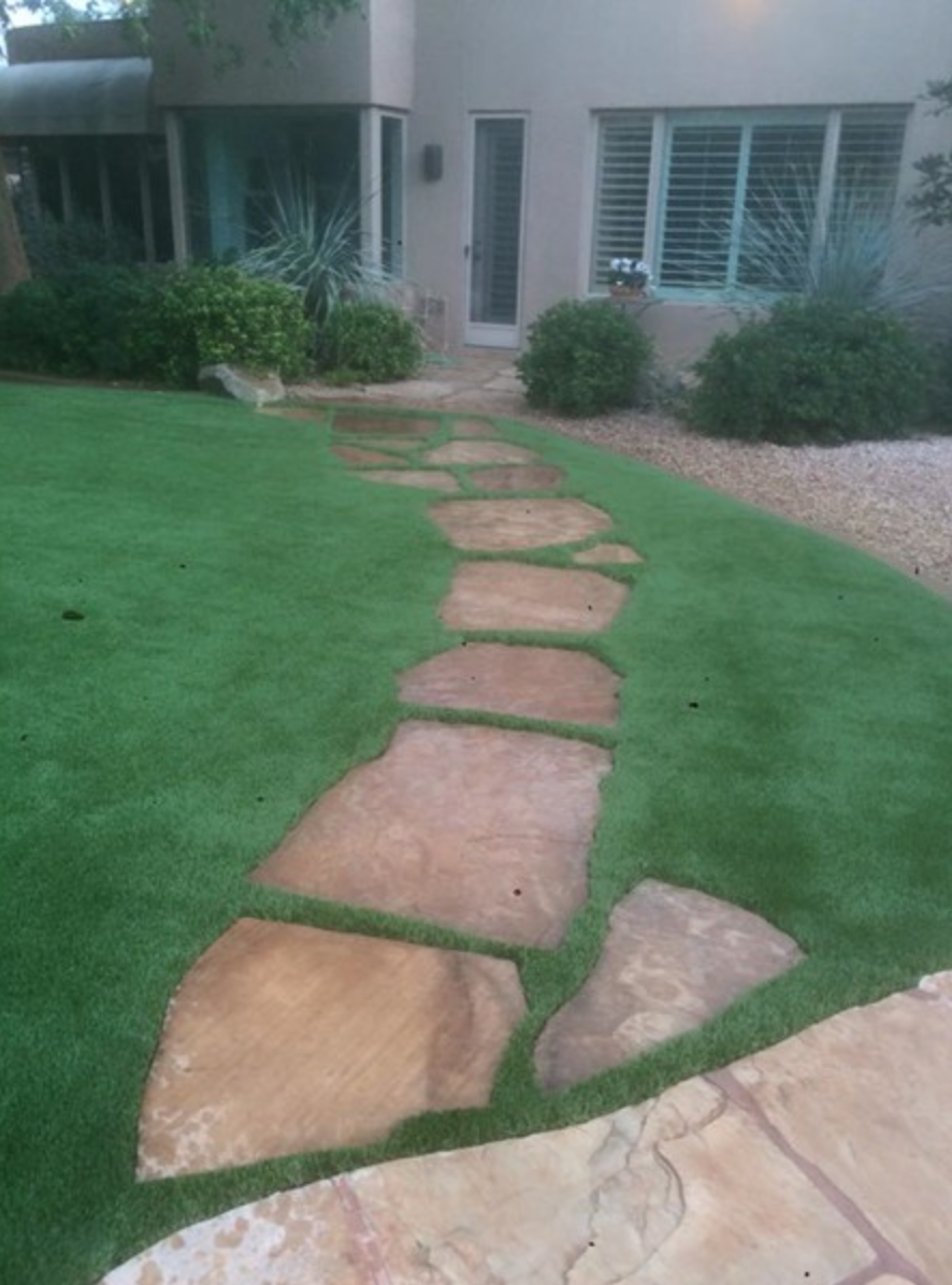  Artificial grass with flagstone walkway inset 