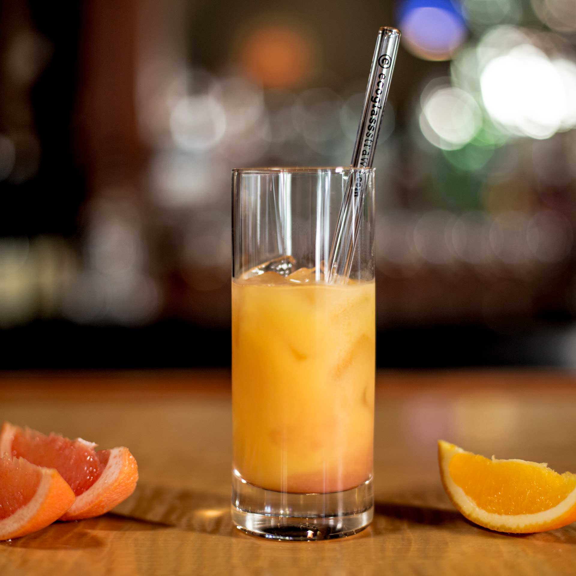 EcoGlassStraw_doubleline_Clear_Glass_straw_gold_inorangejuice_tallglass_clear_Square.jpg