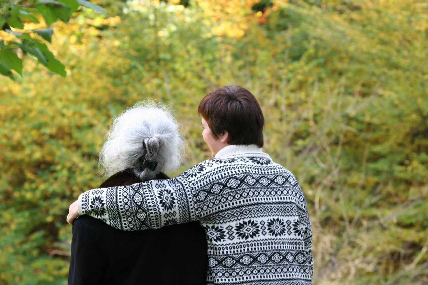 banner_arm_around_elderly_woman.jpg