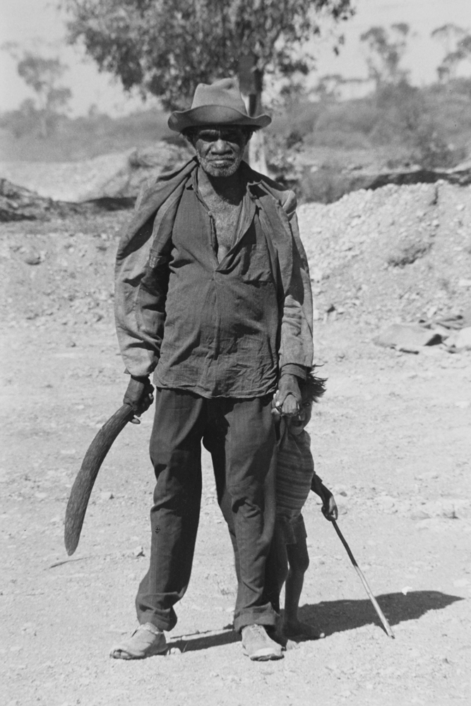 Aboriginal man with child, Meekatharra WA  c.1963