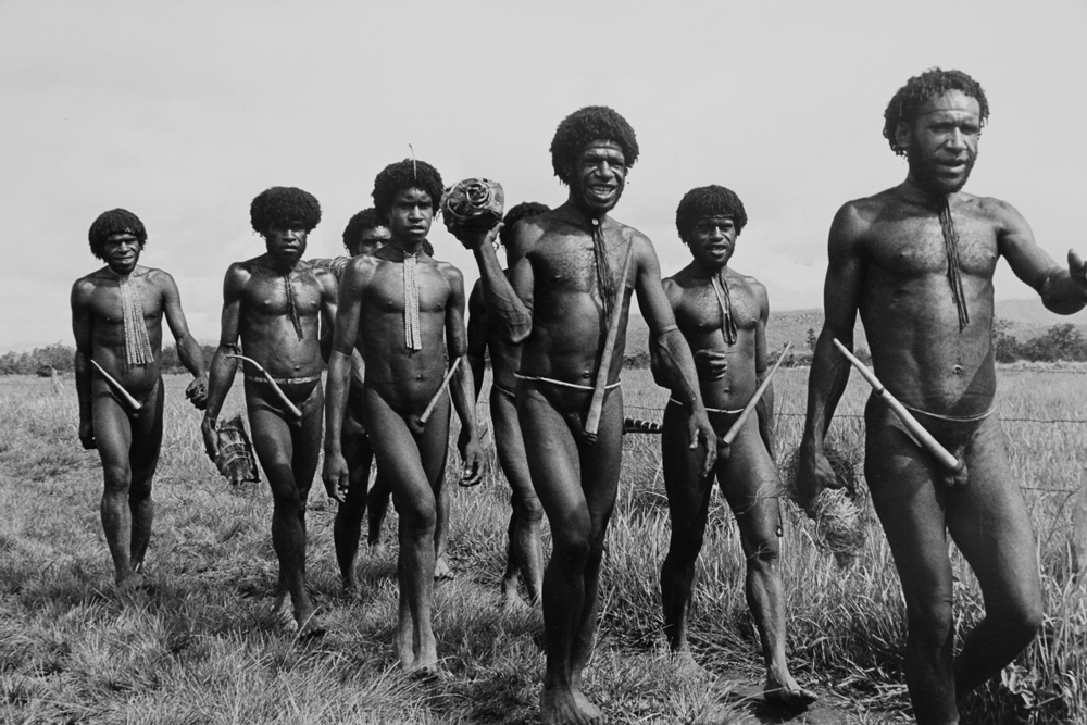 Papuan group of men, Baliem Valley, West Irian Jaya, Indonesia 1971