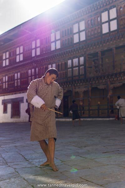 local man dancing in Bhutan in Trongsa Dzong