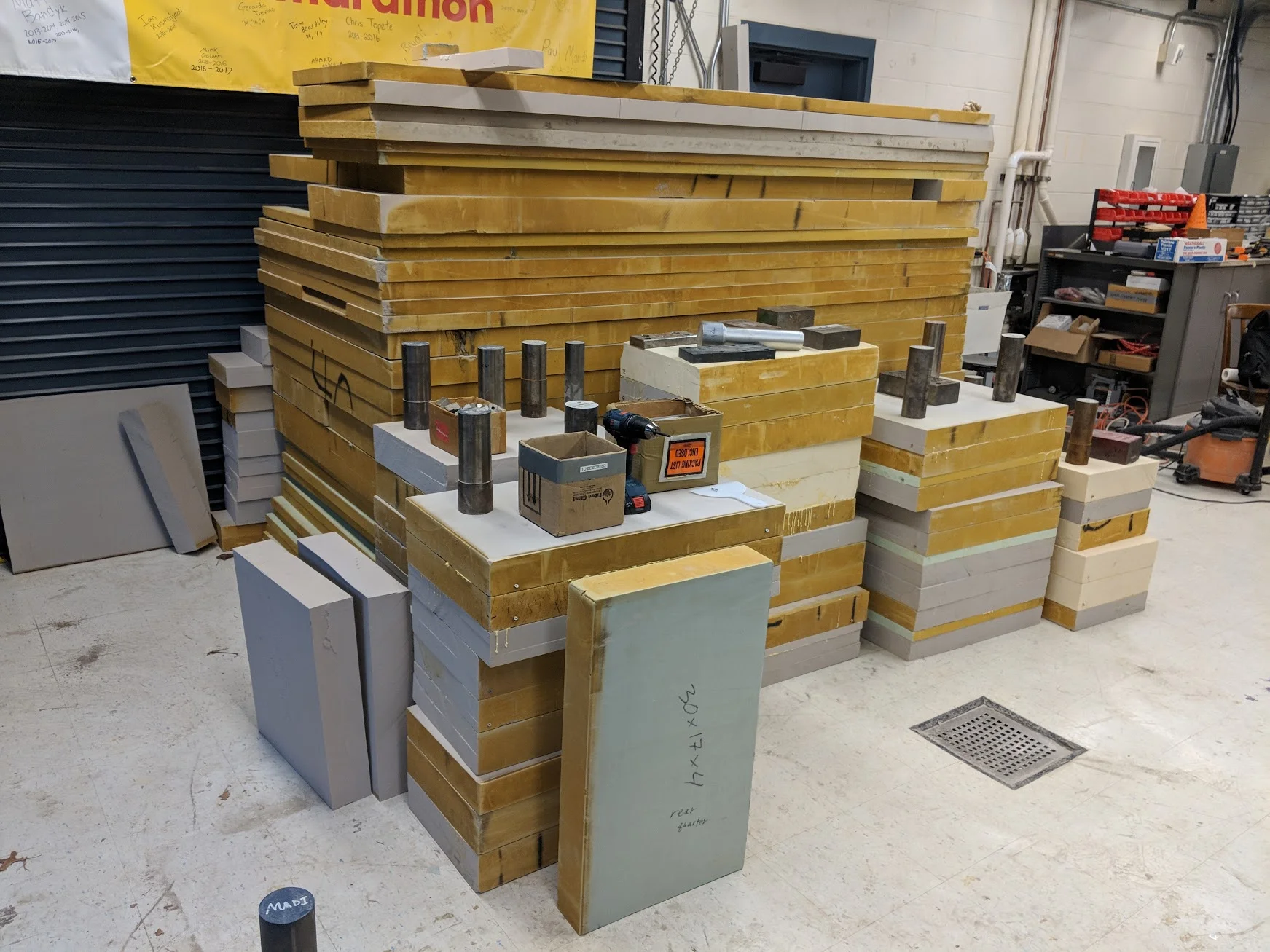 Foam stock glue curing prior to machining.