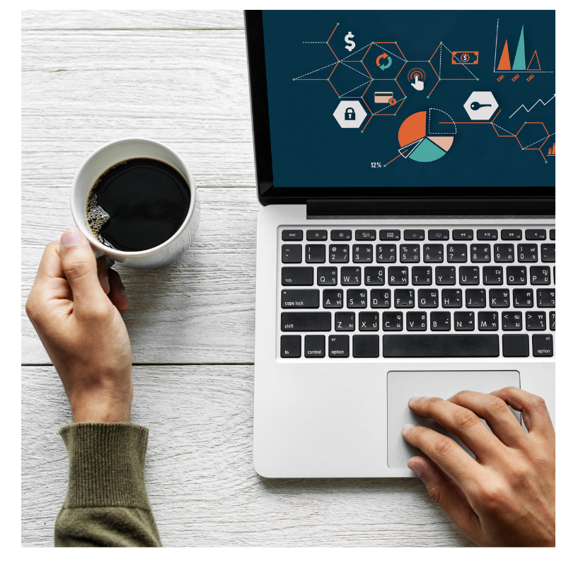 man with computer and coffee.png