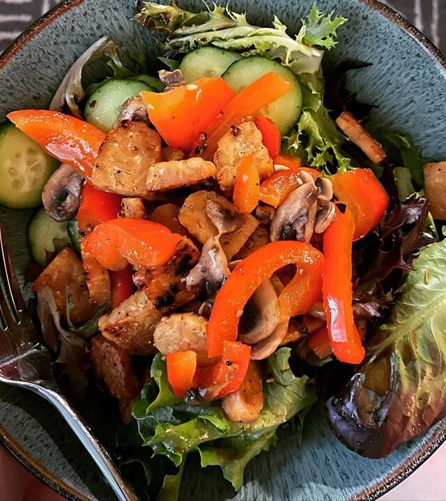 We picked up our first CSA share of the summer and oh my GOSH how I missed big fresh salads! We kept it real simple tonight with these mixed greens, red pepper, garlic, mushrooms, cucumber, and tempeh topped with liquid aminos &amp; olive oil. There 