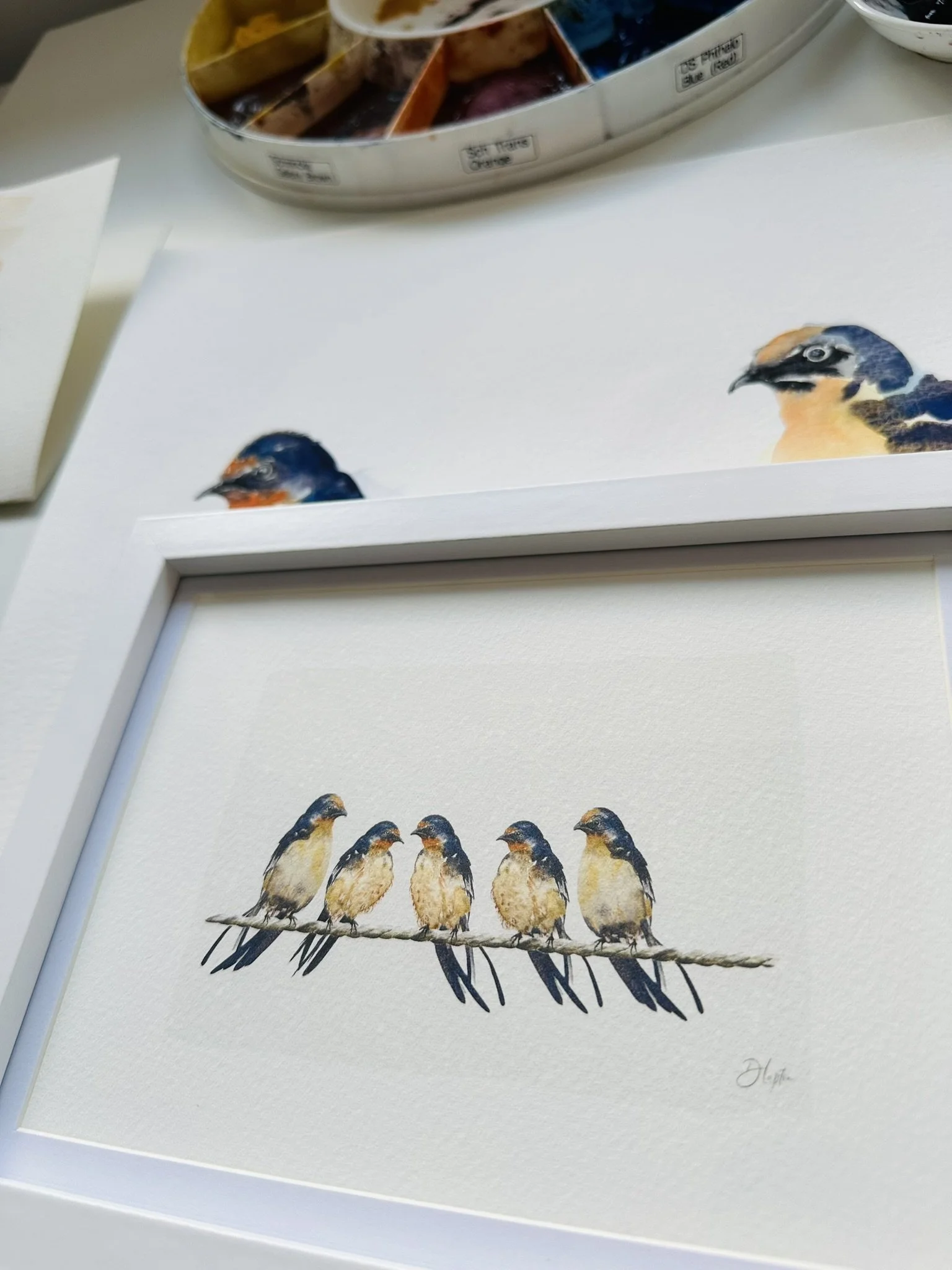 Quillify Studio 25 Desk view Swallow family frame close up.JPEG