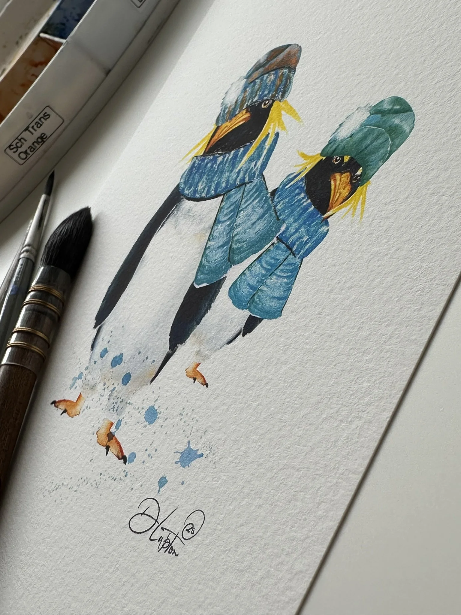 QS25 Watercolour Rockhopper Penguin Hat and Scarf duo desk view.JPEG