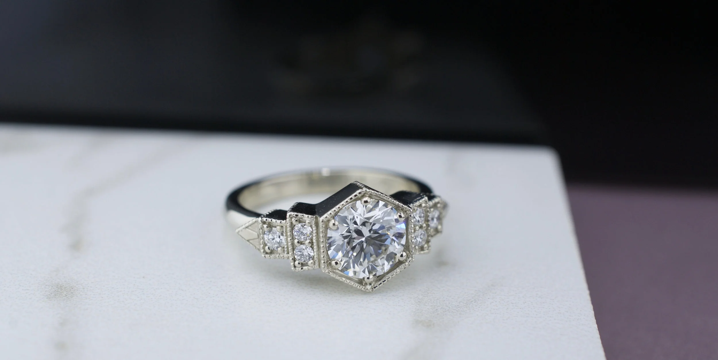 alexandrea-white-gold-diamond-heptagon-geometric-marble.jpg