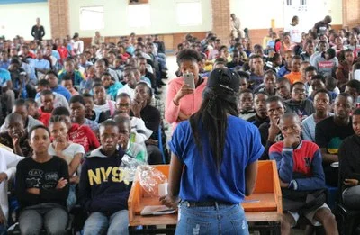 Pelinah delivering a training session
