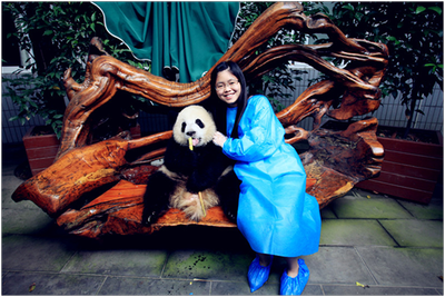 Closely embracing a panda!