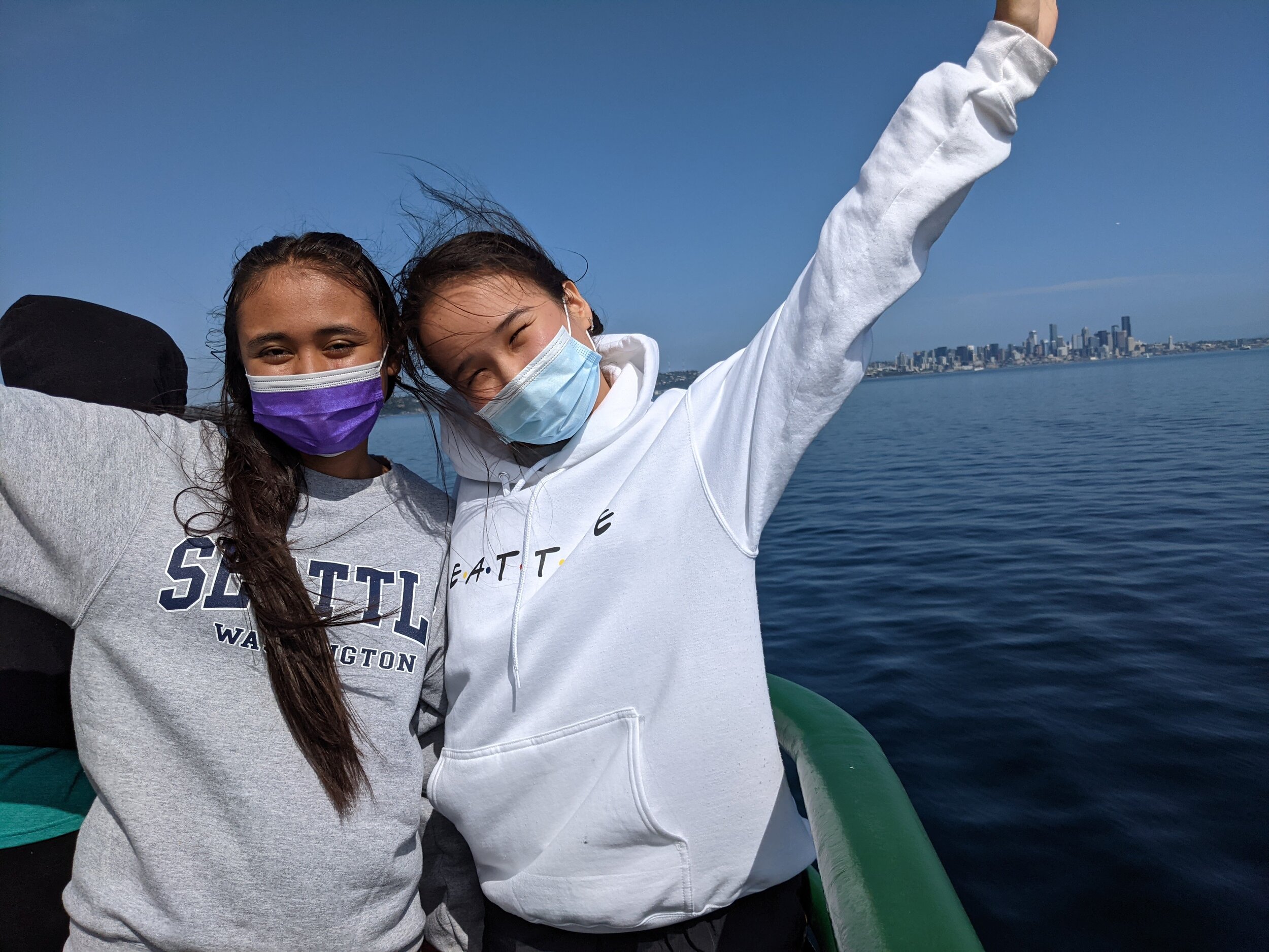 Munira and Aydana representing Seattle on the ferry back from Bainbridge!