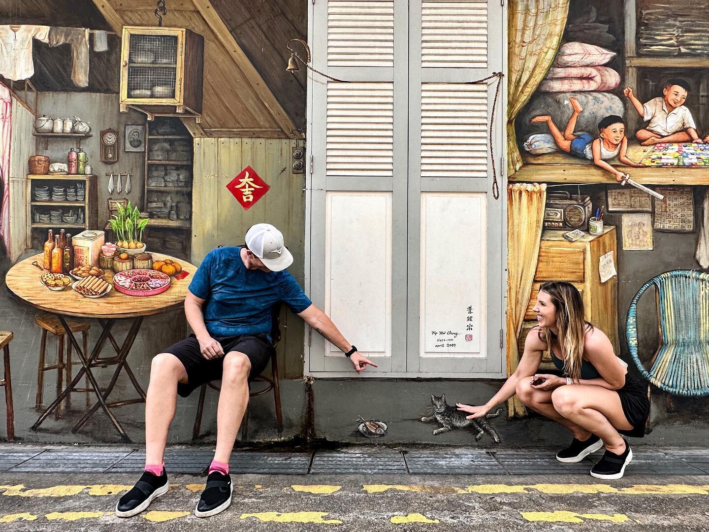 Artist @yipyewchong creating beautiful life size murals so we can transform into his creative mind and memories. #chinatownsingapore 

On our tour yesterday the guide boasted Singapore is the most racially harmonious places in the world. A woman from