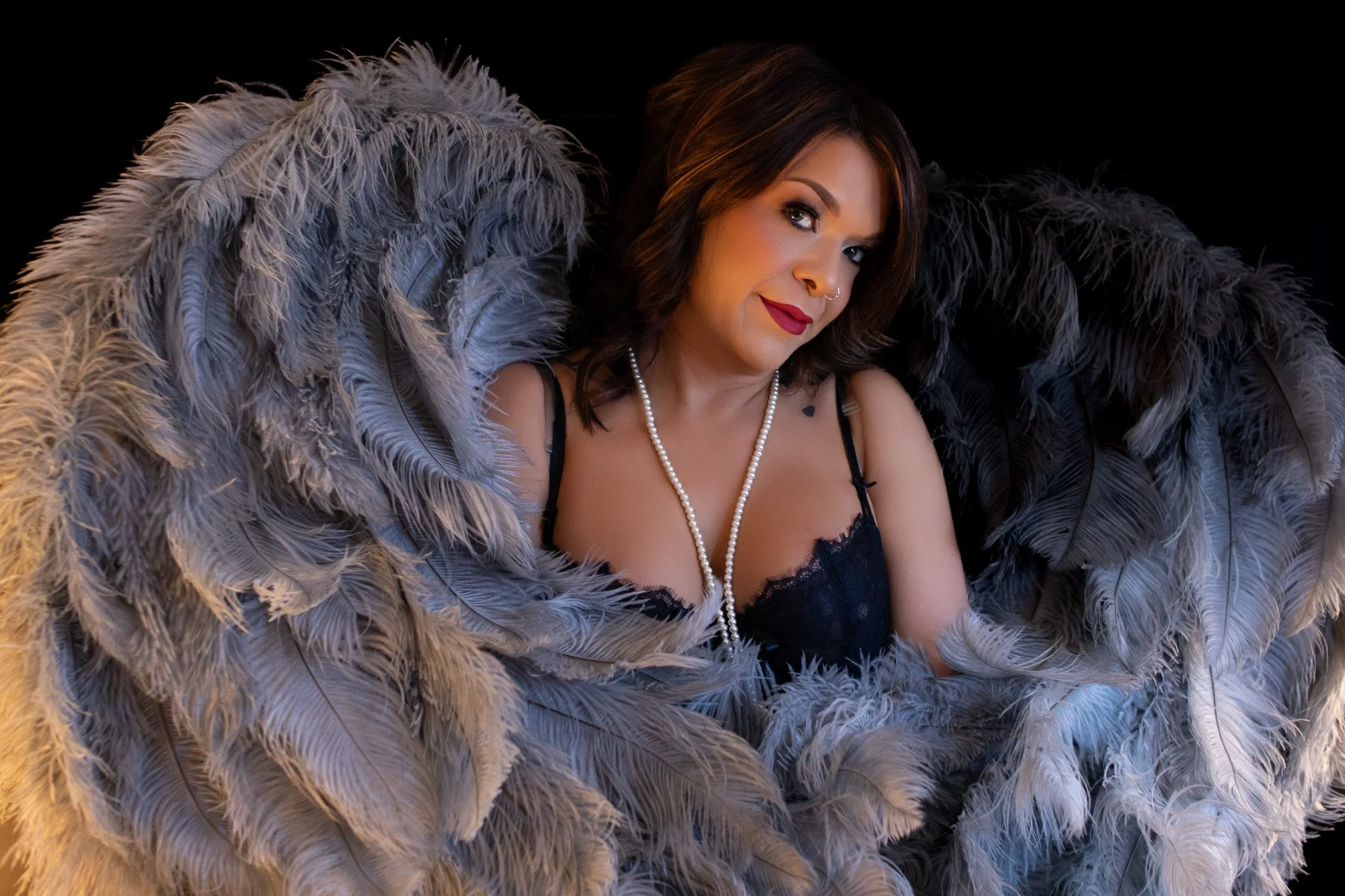 KC woman poses in wings for 41st birthday boudoir