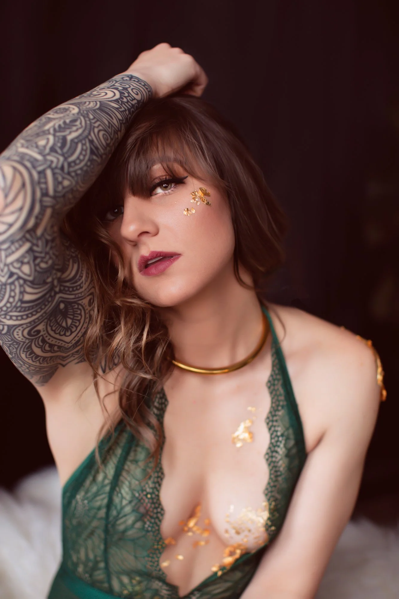 Women in green lingerie with gold foil