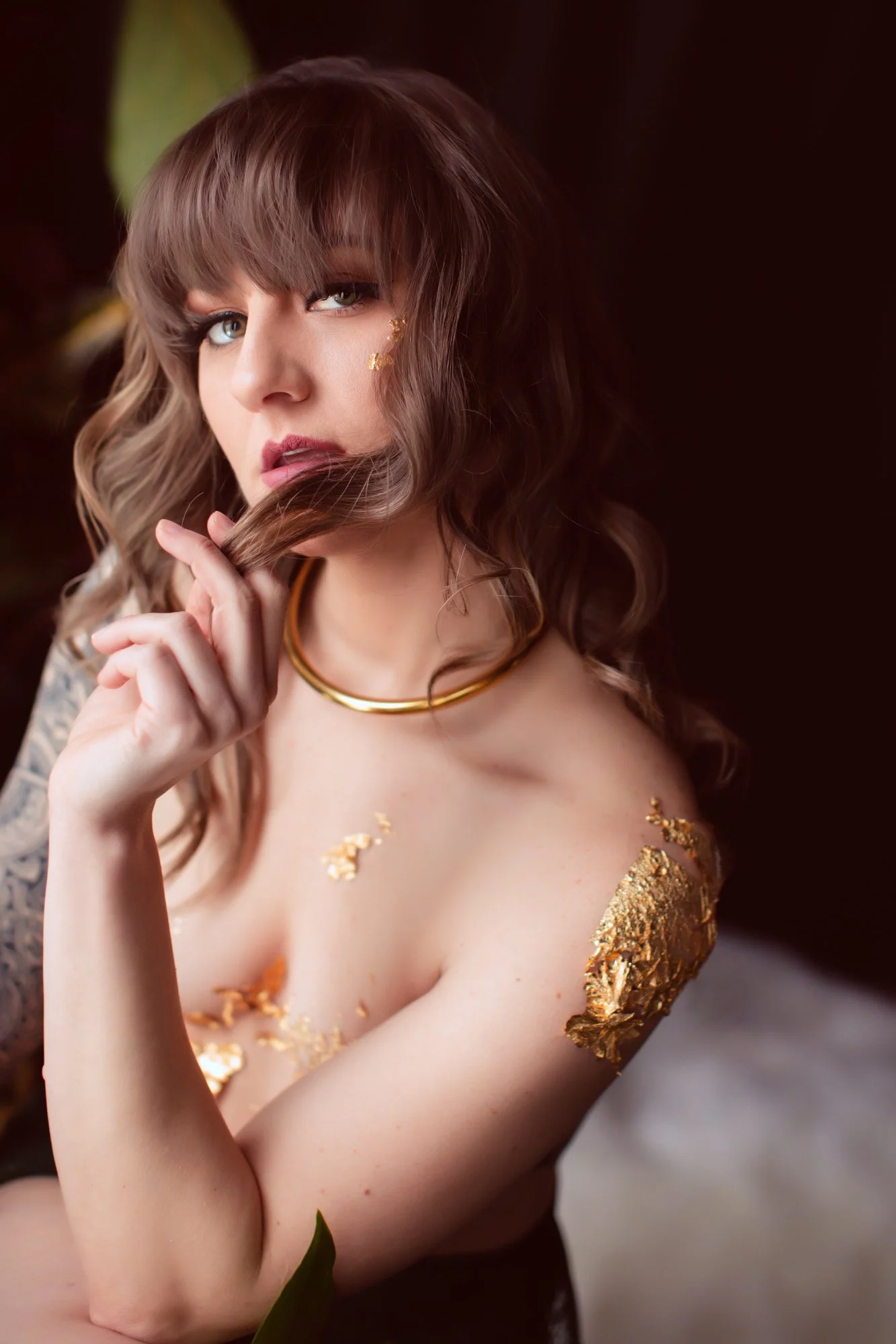 Women in green lingerie with gold foil