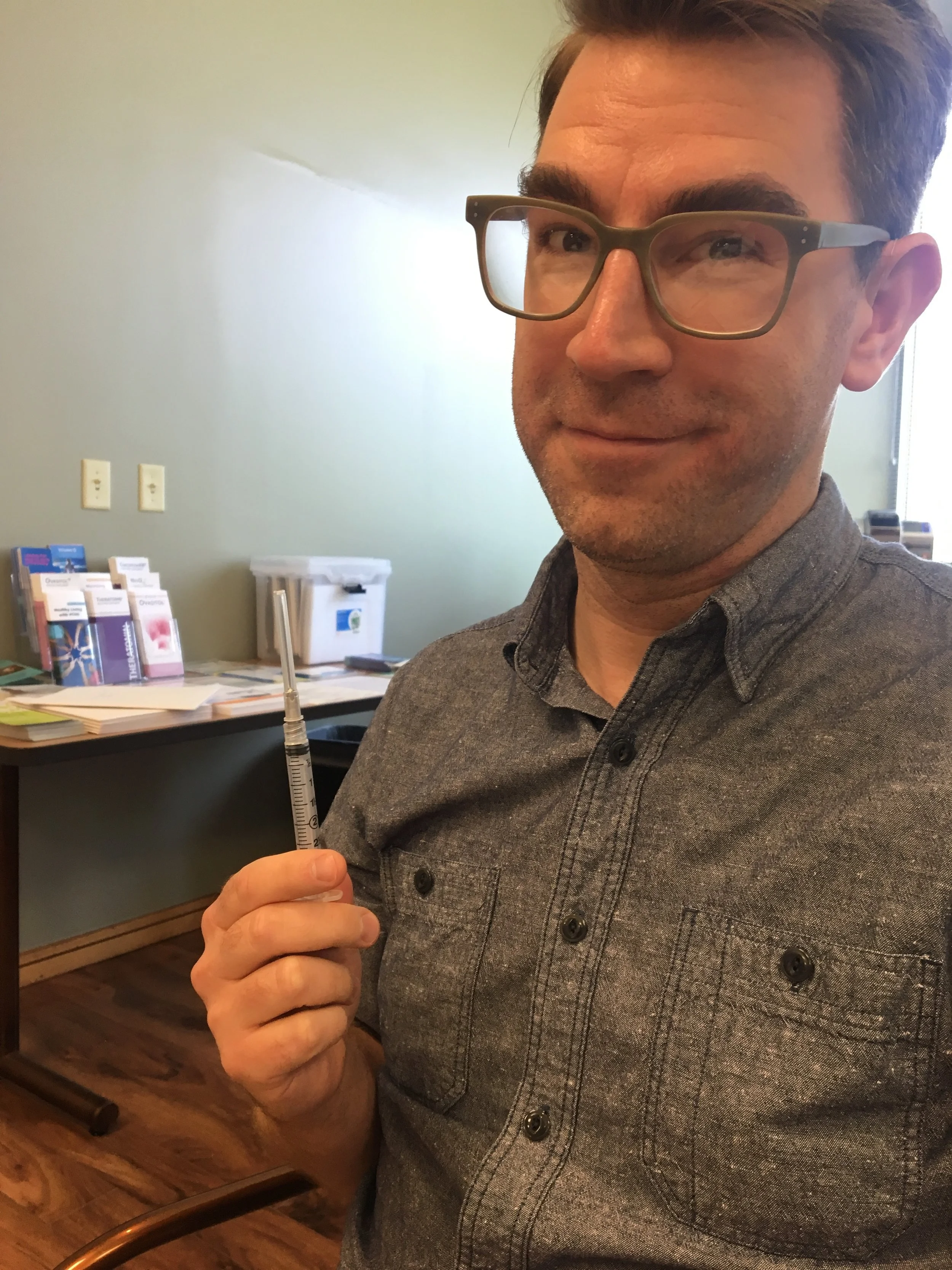 Cory with needle.JPG