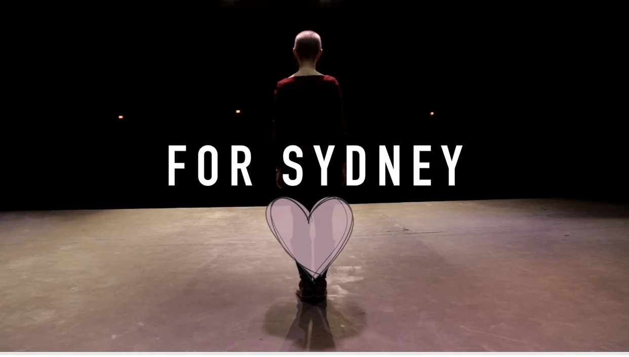 A shot from Dancing Around the Subject, an “award winning short student documentary about a breast cancer survivor normalizing her life again featuring her relationship with her 4 year old daughter.” See link to this documentary about Stacey below.