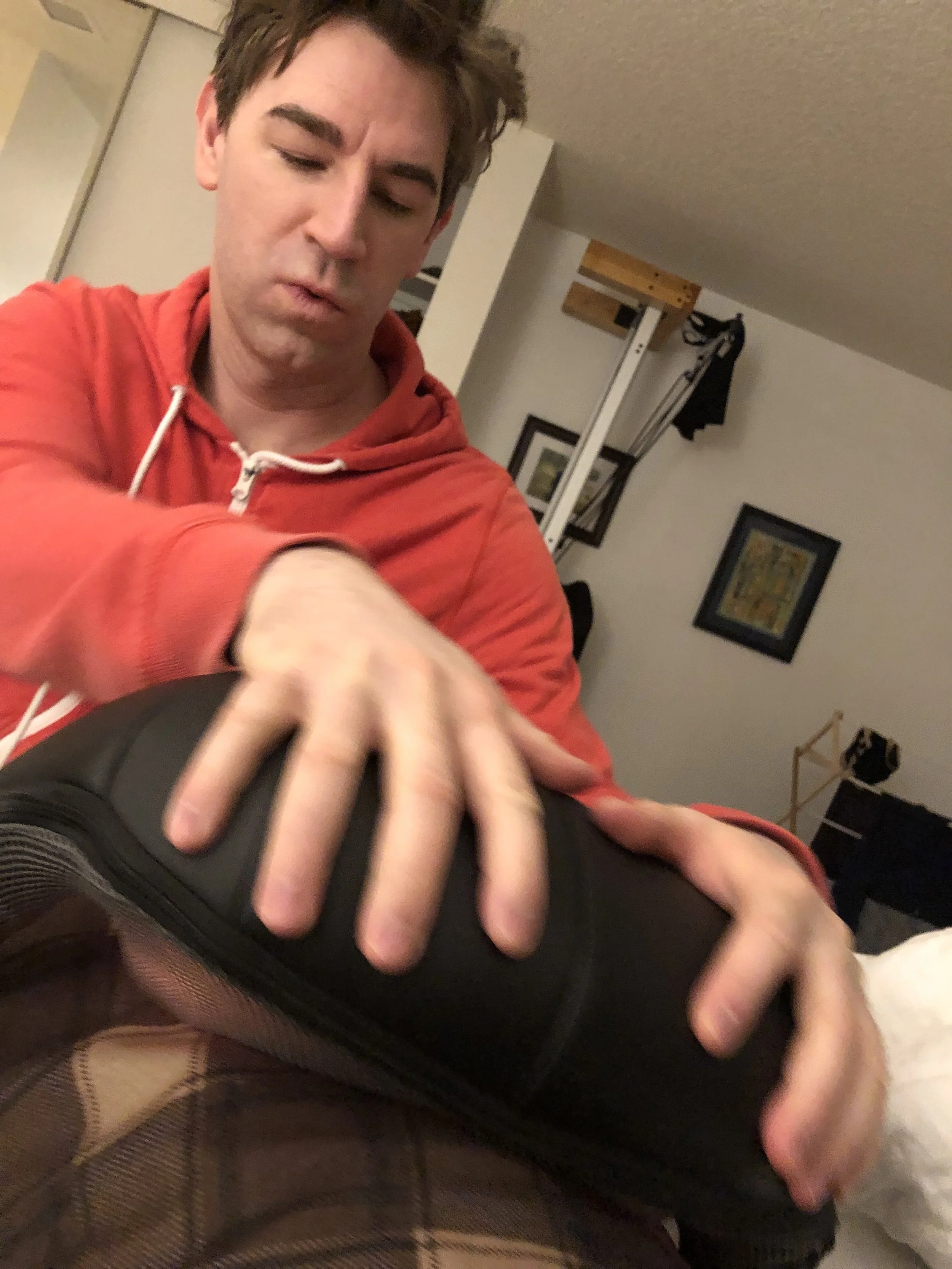 Cory massaging my injection site. First layer: heating pad. Second layer: fancy massager.