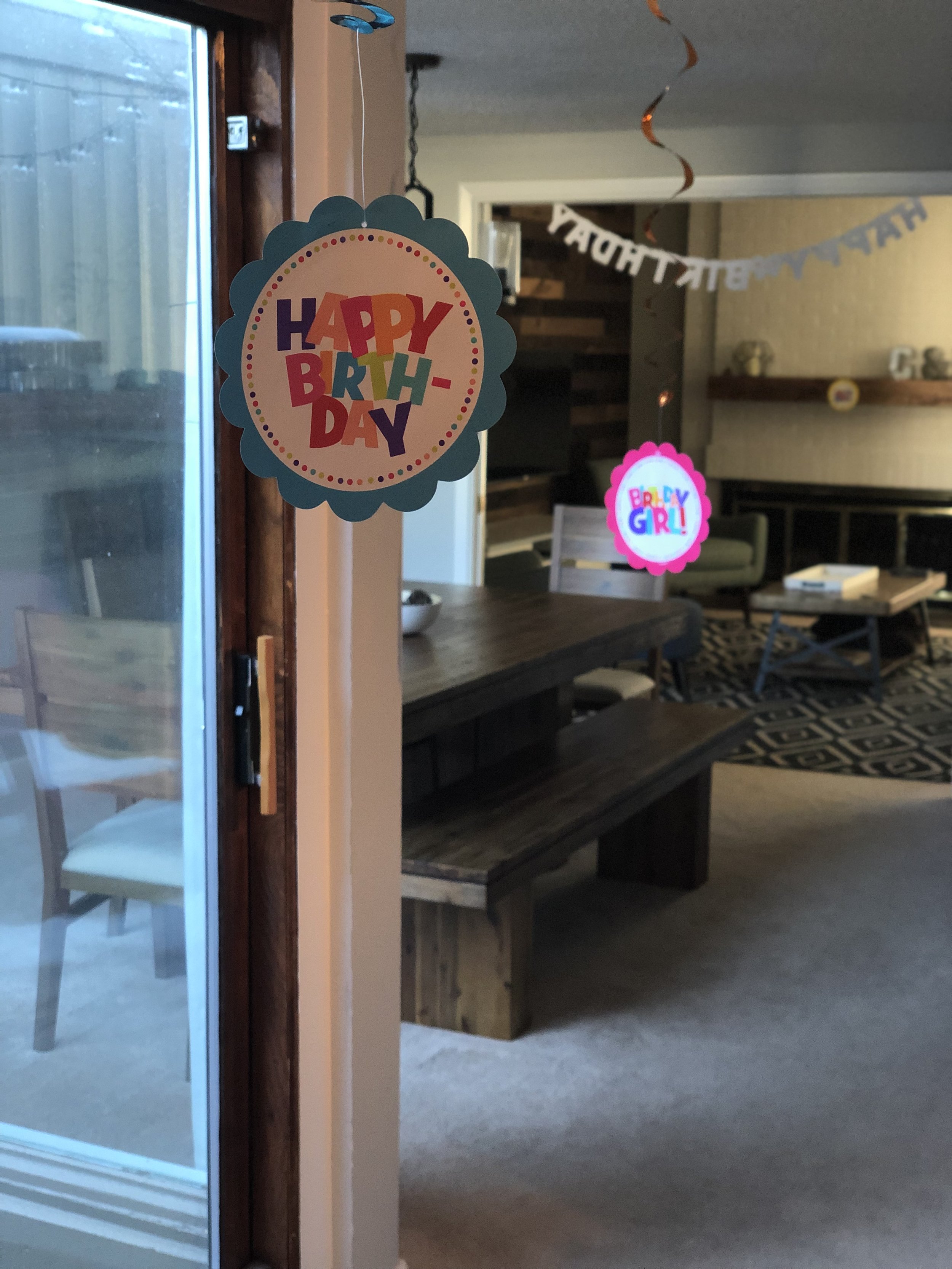 Happy birthday decorations looking into dining.jpg