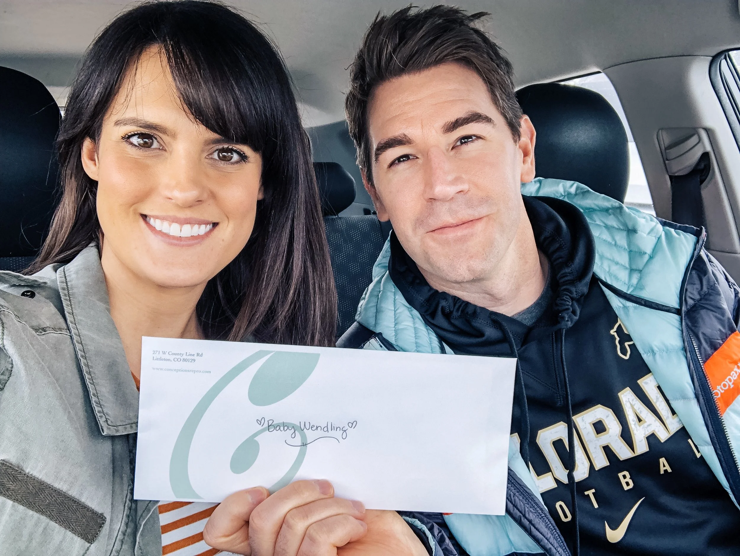 Cory and I in the car after the appointment with the enveloping containing our baby’s gender!