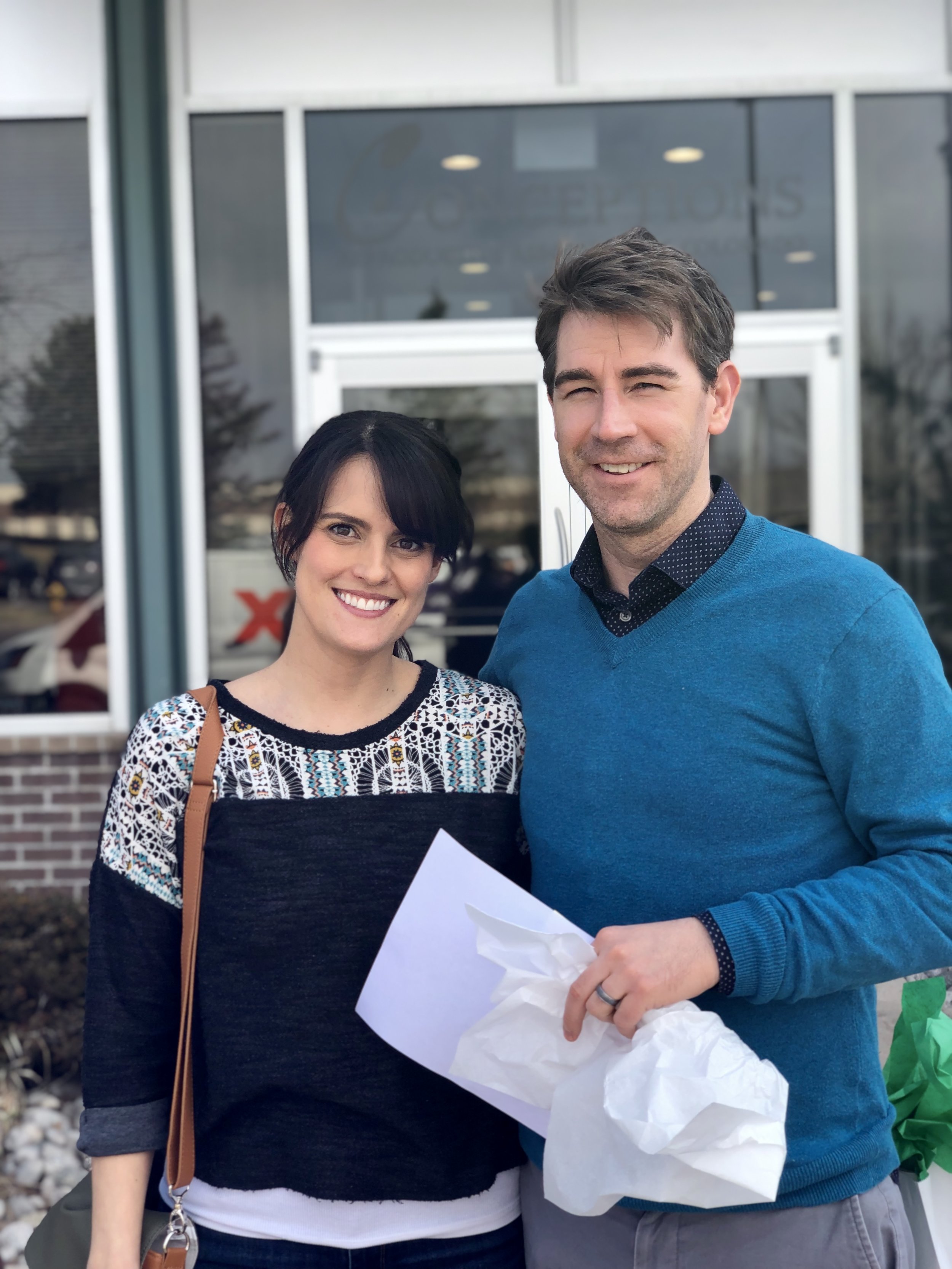 Two very happy and relieved parents leaving their fertility clinic for good! (Or until we’re ready for baby #2!)