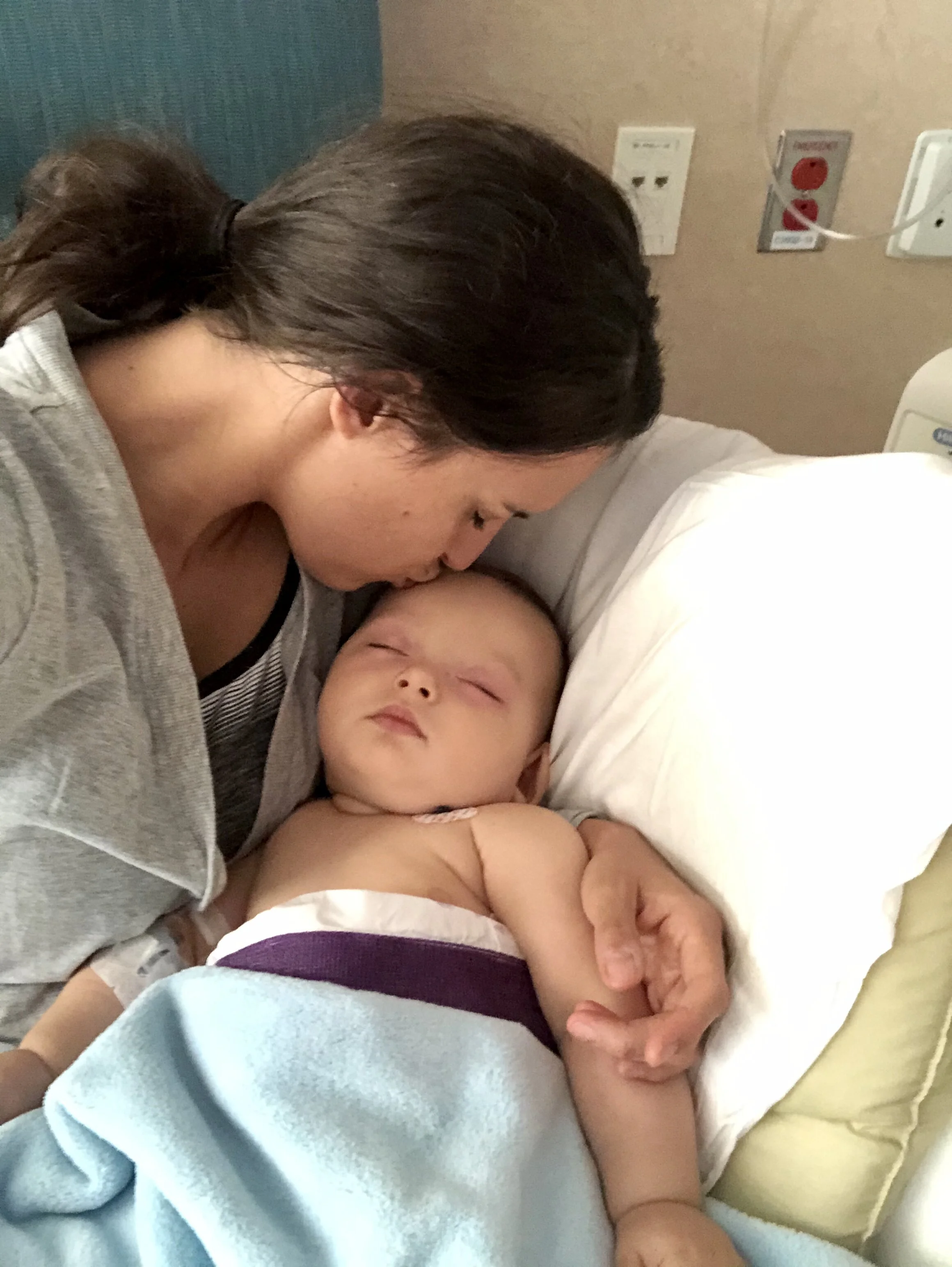Puffy-faced post-surgery. Gah, it’s so hard to see your baby suffer.