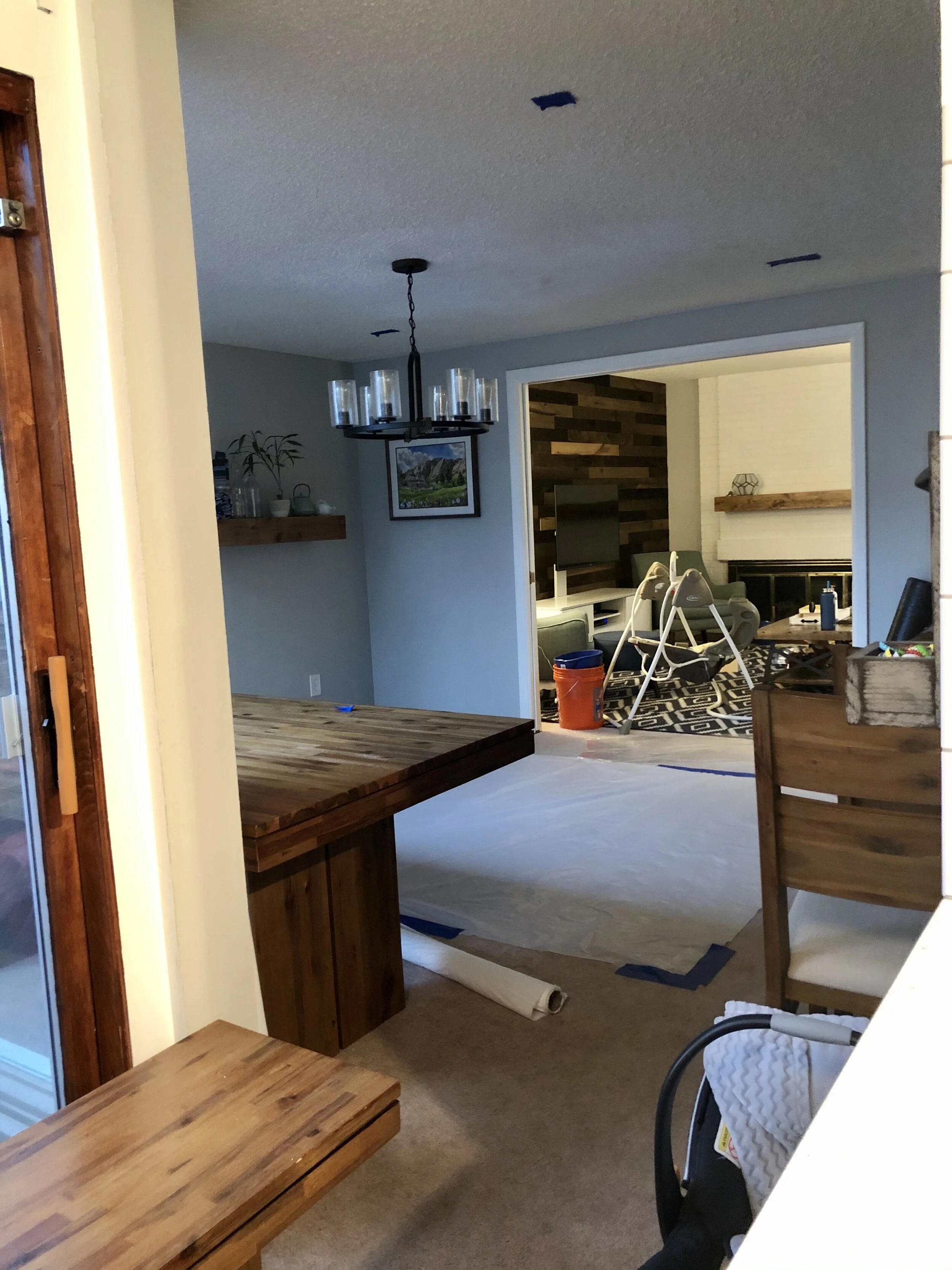 Water damage insanity. Can you see where the water pooled in the ceiling of the dining room?