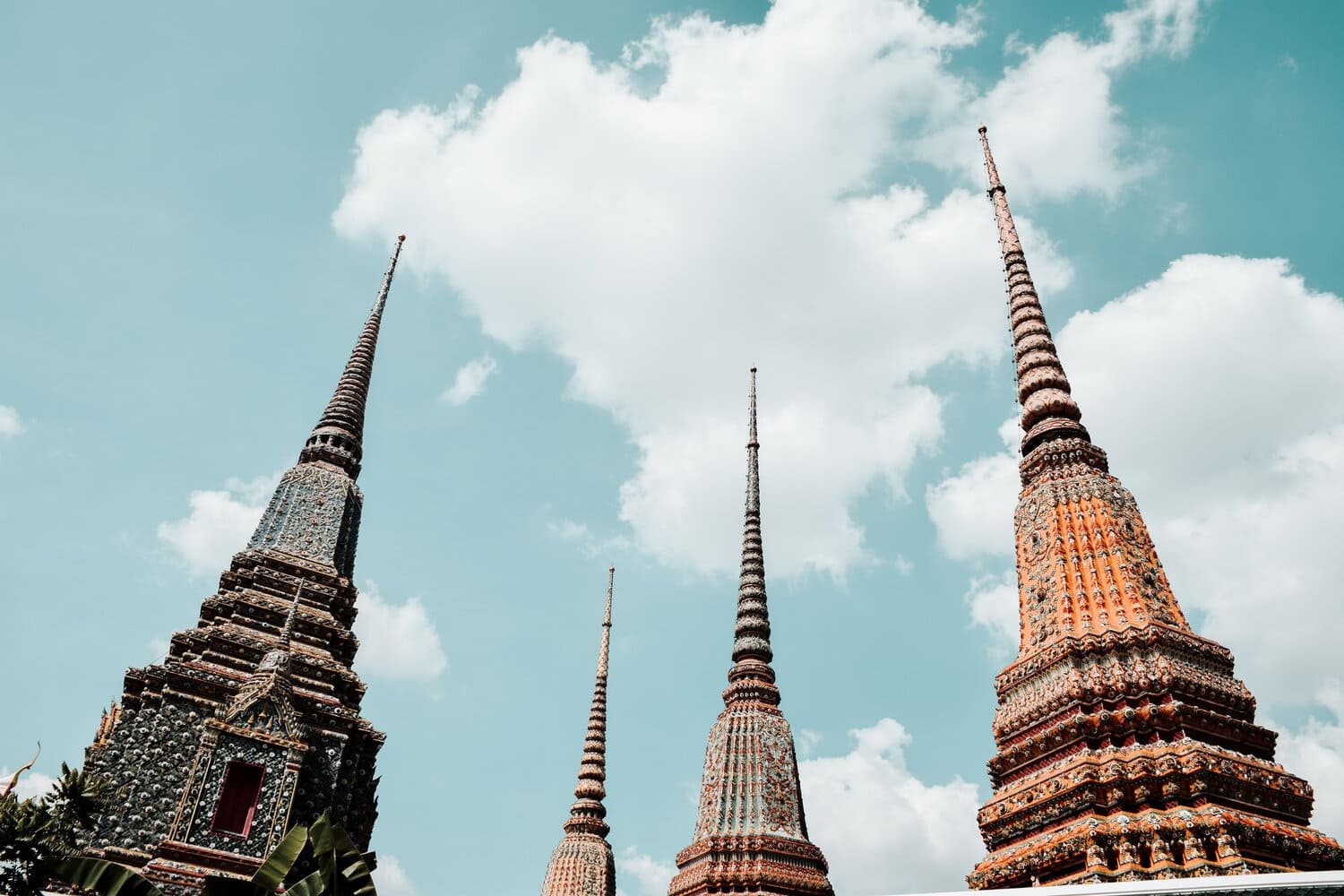 temple peaks in thailand with sky and clouds in background.jpeg