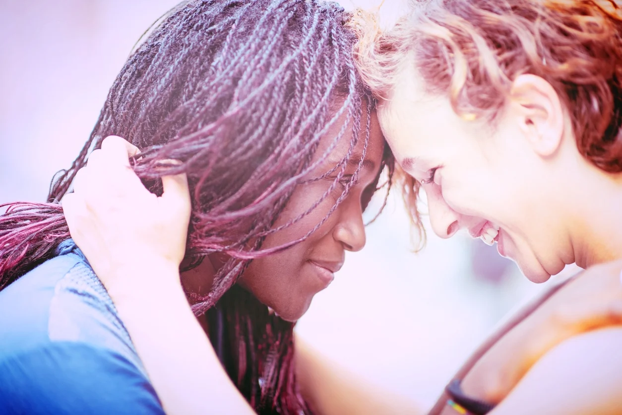 Mixed-race-girlfriends-enjoying-to-stay-together-479703044_1258x838.jpeg