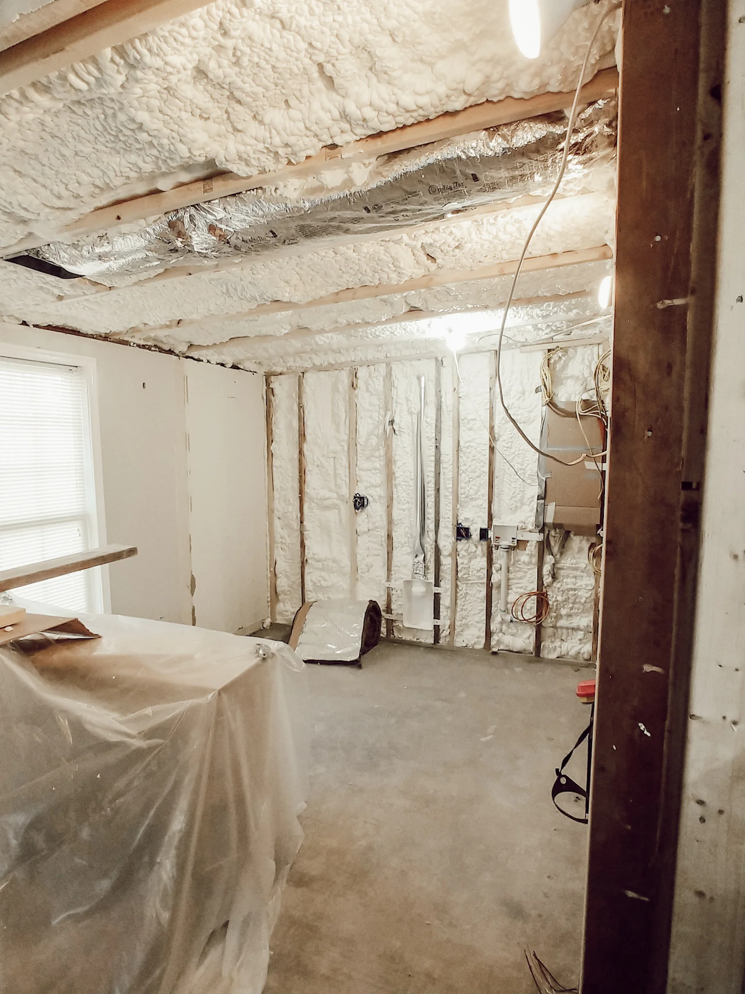 The spray foam was so cool to see even if the room looks a little scary .