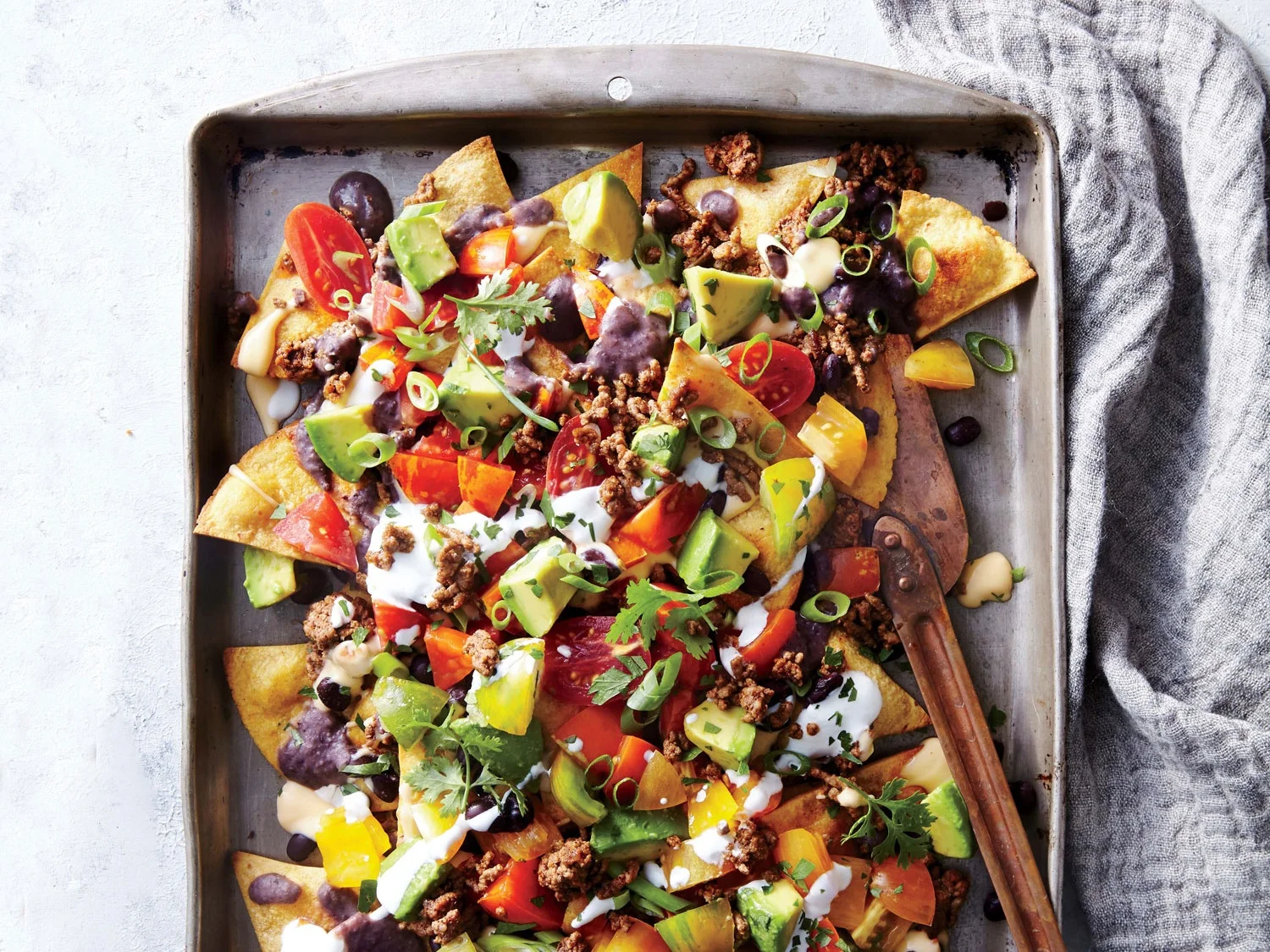 1611p28-sheet-pan-beef-and-black-bean-nachos_0.jpg