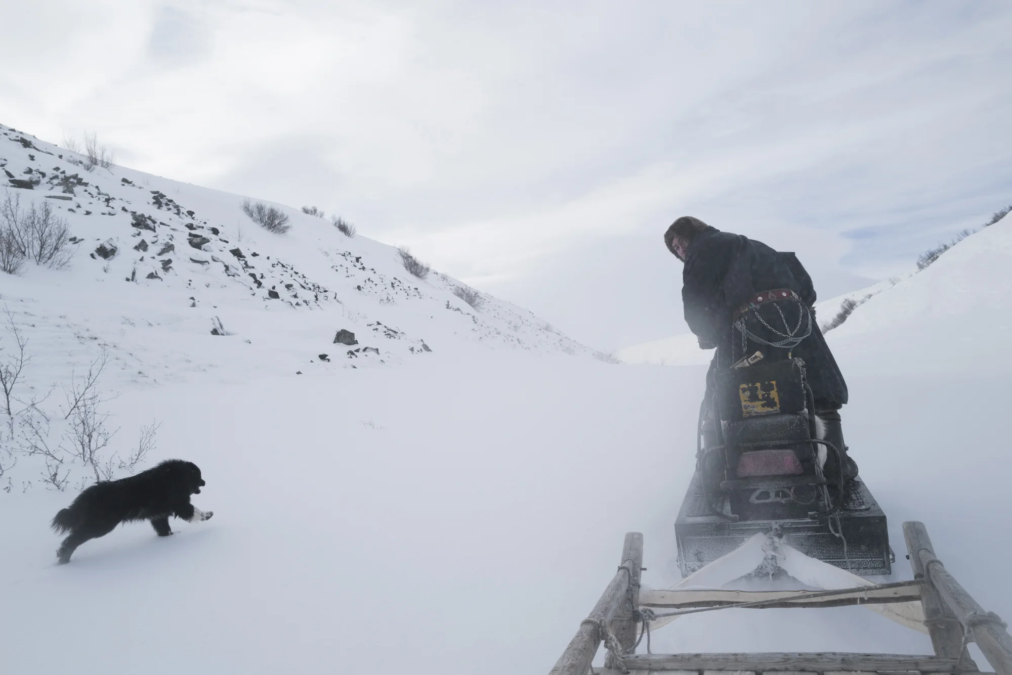 Stefan on his snow mobile, going up the mountains to herd down the reindeers. Photographed with Leica Q2, Siberia, 2019. © Rosalynn Tay.