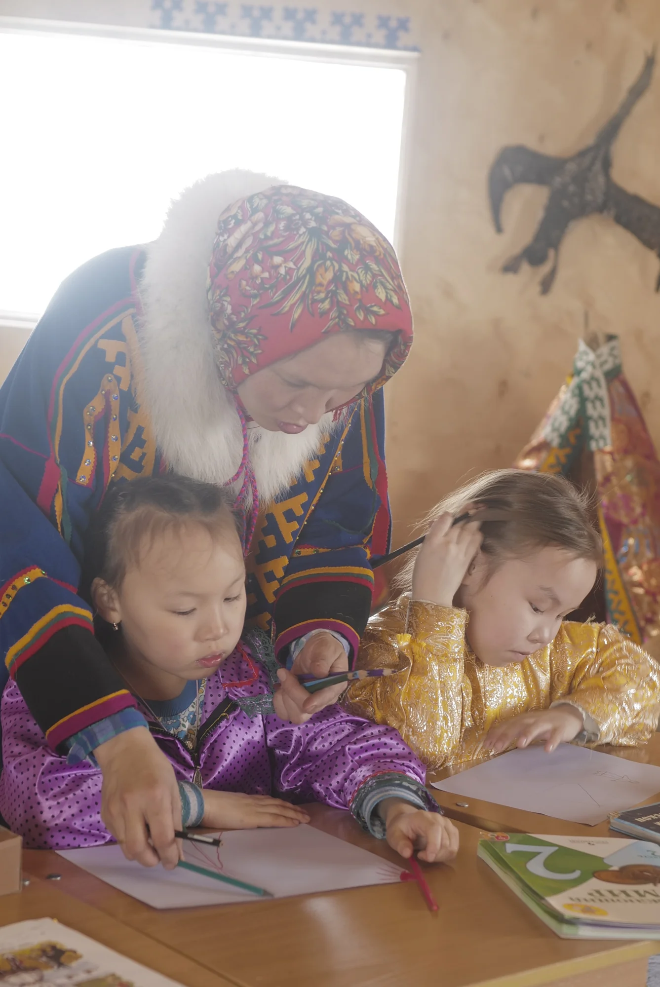 Nenets school teacher is teaching her students in the classroom. Photographed with Leica Q2, Siberia, 2019. © Rosalynn Tay.