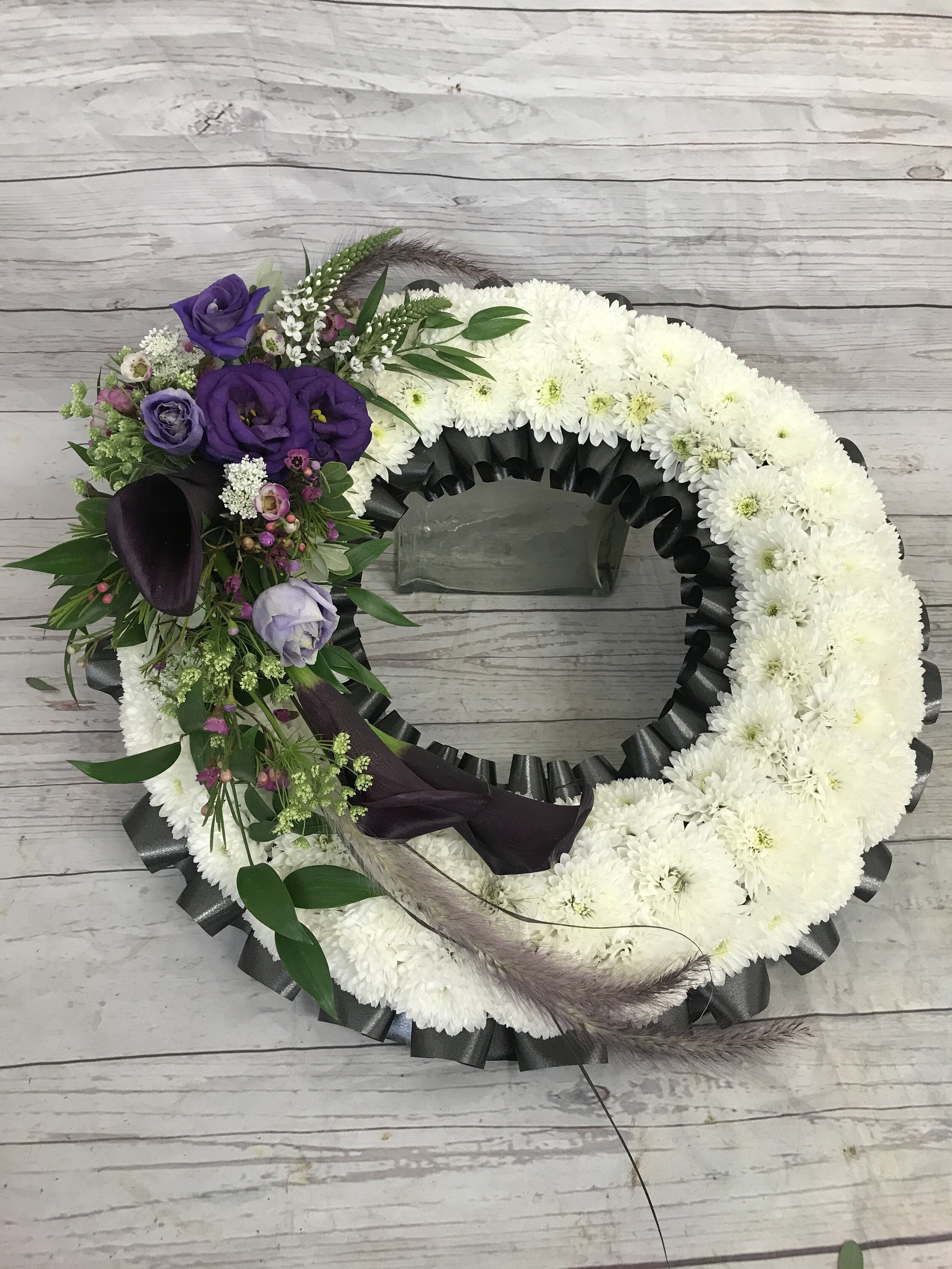 white funeral wreath