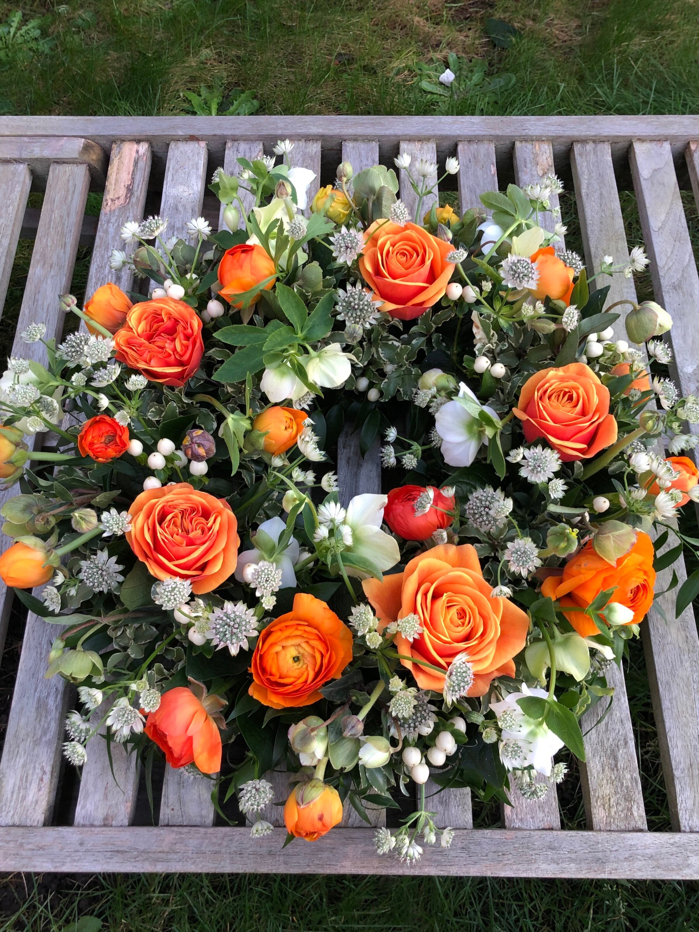 orange funeral wreath