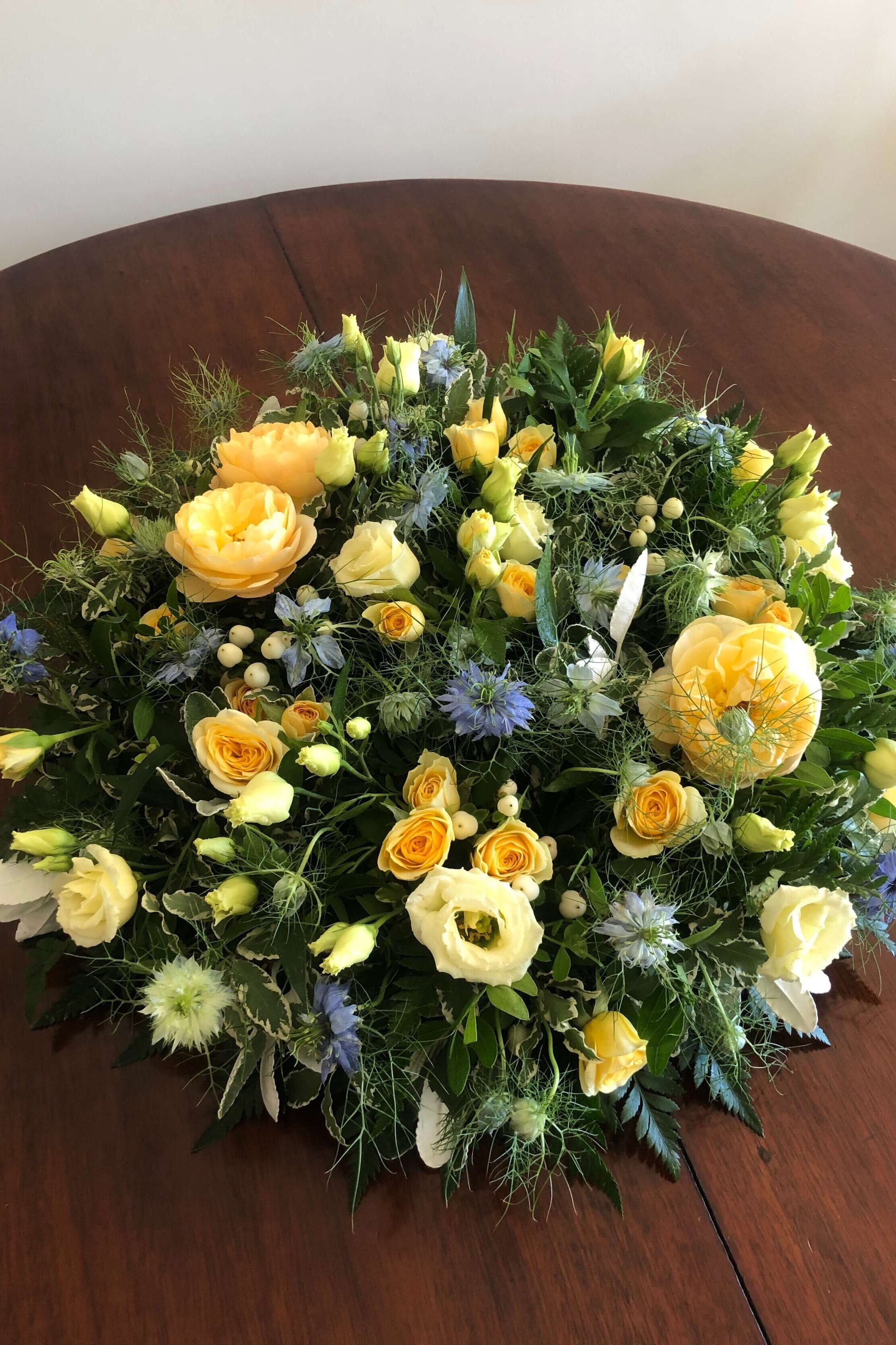 yellow spring funeral wreath