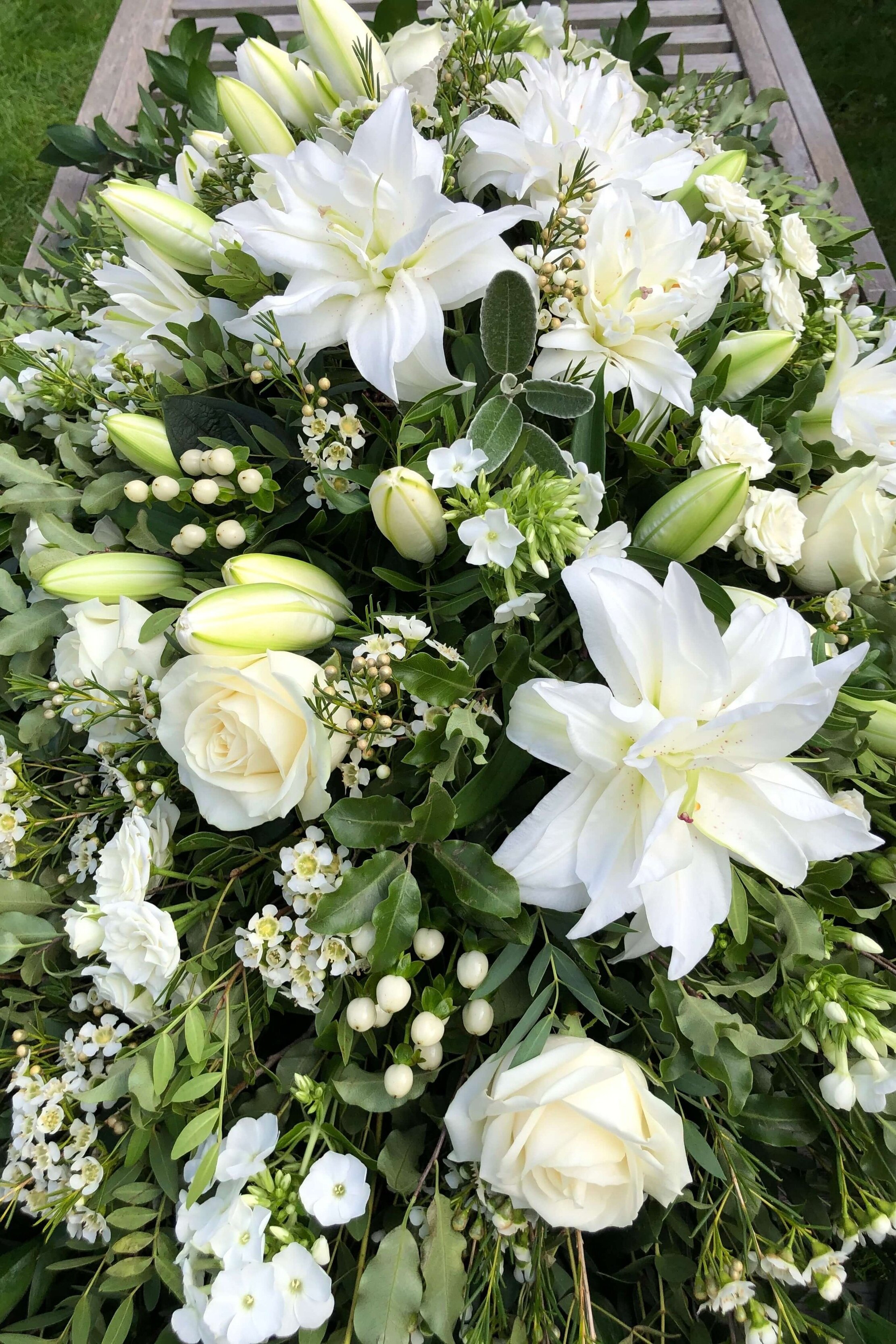 White rose and lily double ended funeral spray