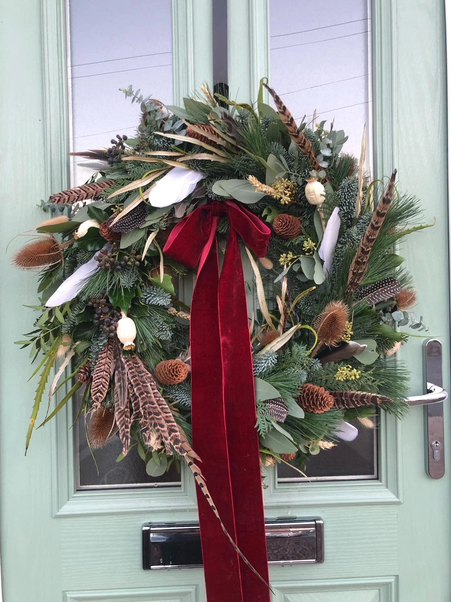 The first made wreath of the season is now festively welcoming customers @thefalconwarmington - still taking orders if your front door needs some love this Christmas 🎄 .
.
.
#jh_floraldesign #florist #smalllocalbusiness #flowers  #forestofdean #stra
