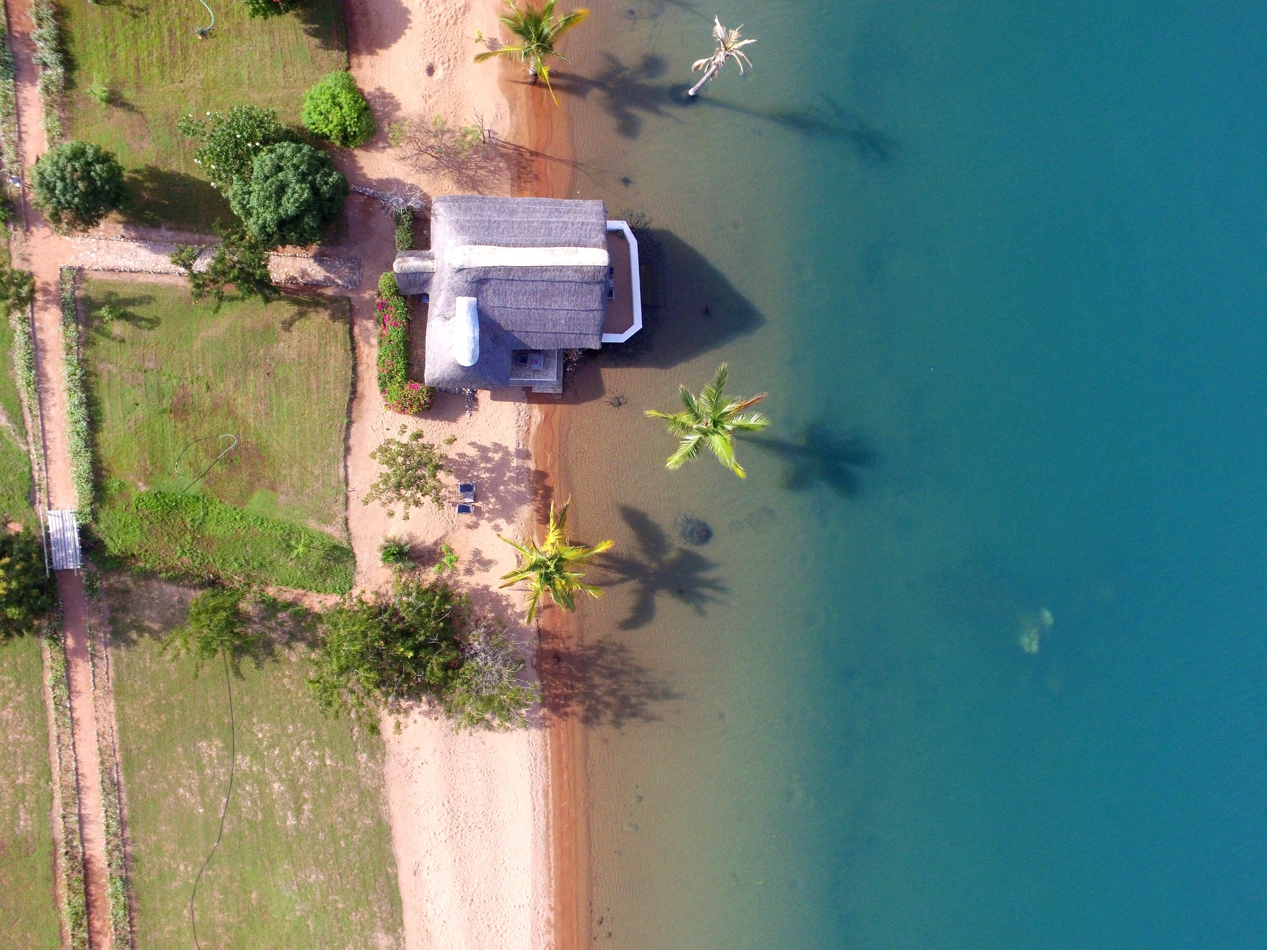 Lake Shore Lodge Tz - Lake Tanganyika - Honeymoon Suite from the air.JPG