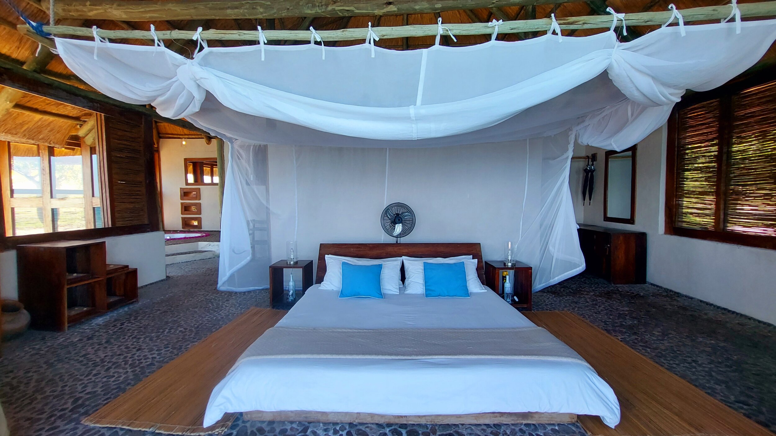 Lake Shore Lodge - Lake Tanganyika - Honeymoon Suite bedroom.jpg