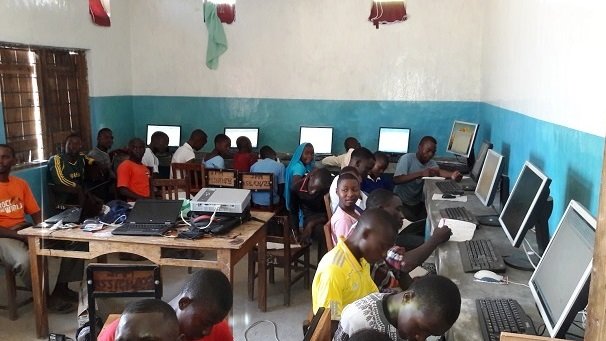 Lake Shore Lodge Tz - Lake Tanganyika - Giving Back - First Students learning computers.jpg